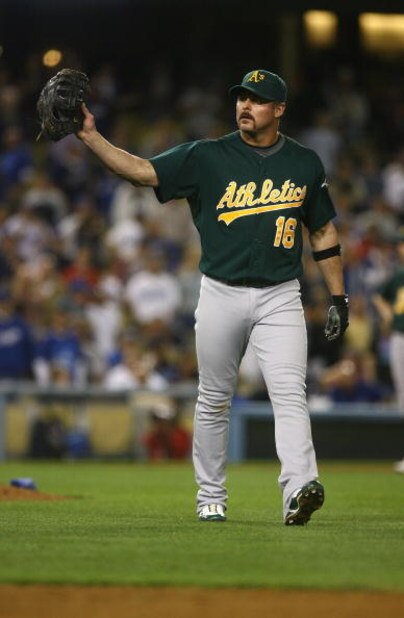 LOS ANGELES, CA - JUNE 16:  Jason Giambi #16 of the Oakland Athletics motions towards the dugout against the Los Angeles Dodgers at Dodger Stadium on June 16, 2009 in Los Angeles, California. The Dodgers defeated the Athletics 5-4 in ten innings.  (Photo 