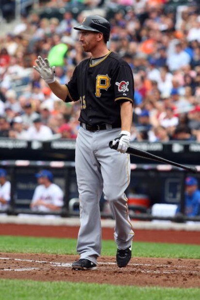 NEW YORK - MAY 09:  Adam LaRoche #25 of the Pittsburgh Pirates bats against the New York Mets on May 9, 2009 at Citi Field in the Flushing neighborhood of the Queens borough of New York City. The Mets defeated the Pirates 10-1.  (Photo by Jim McIsaac/Gett