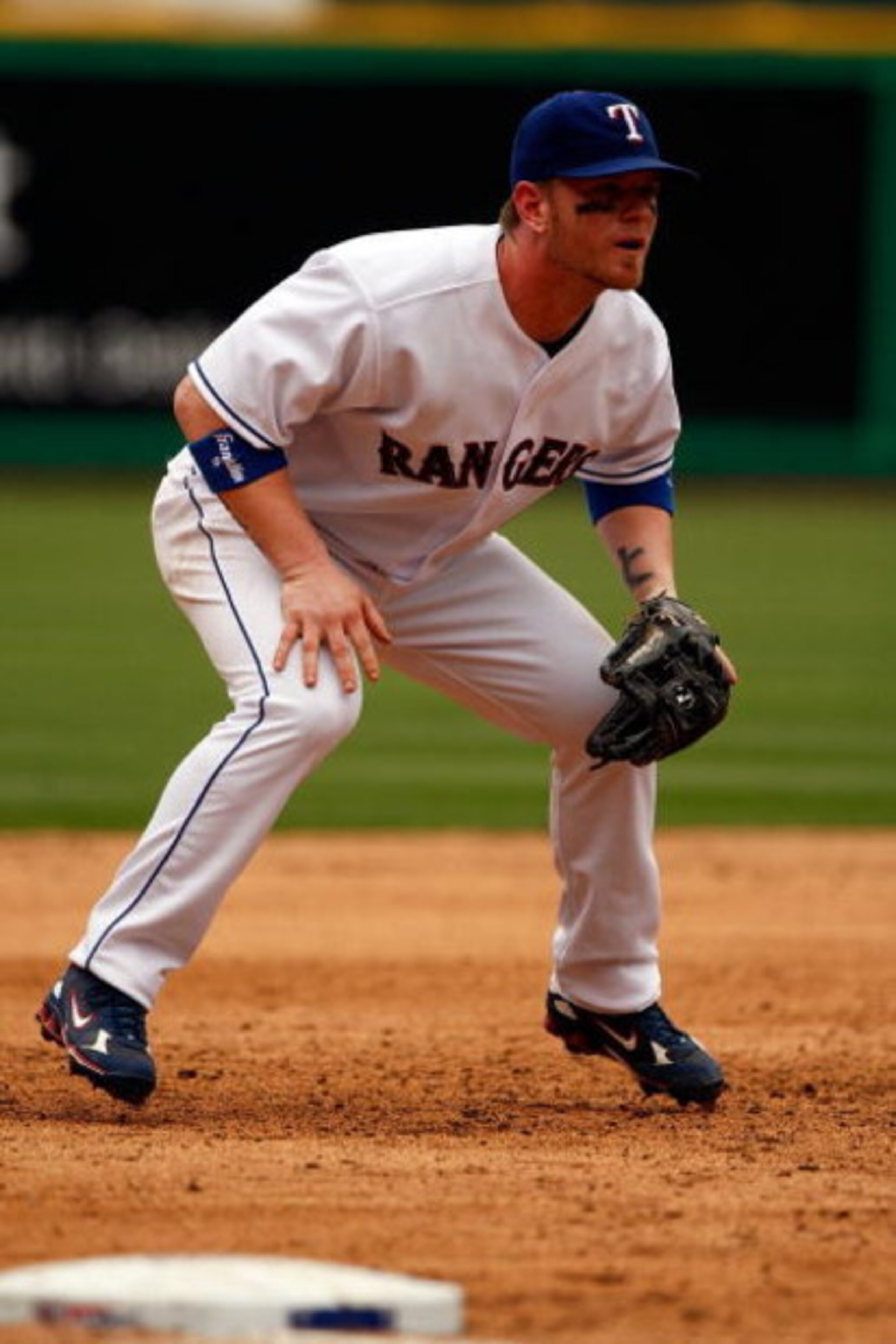 ARLINGTON, TX - APRIL 08:  Hank Blalock #9 of Texas Rangers waits for a play against the Baltimore Orioles on April 8, 2008 at Rangers Ballpark in Arlington, Texas. The Orioles defeated the Rangers 8-1.  (Photo by Chris Graythen/Getty Images)
