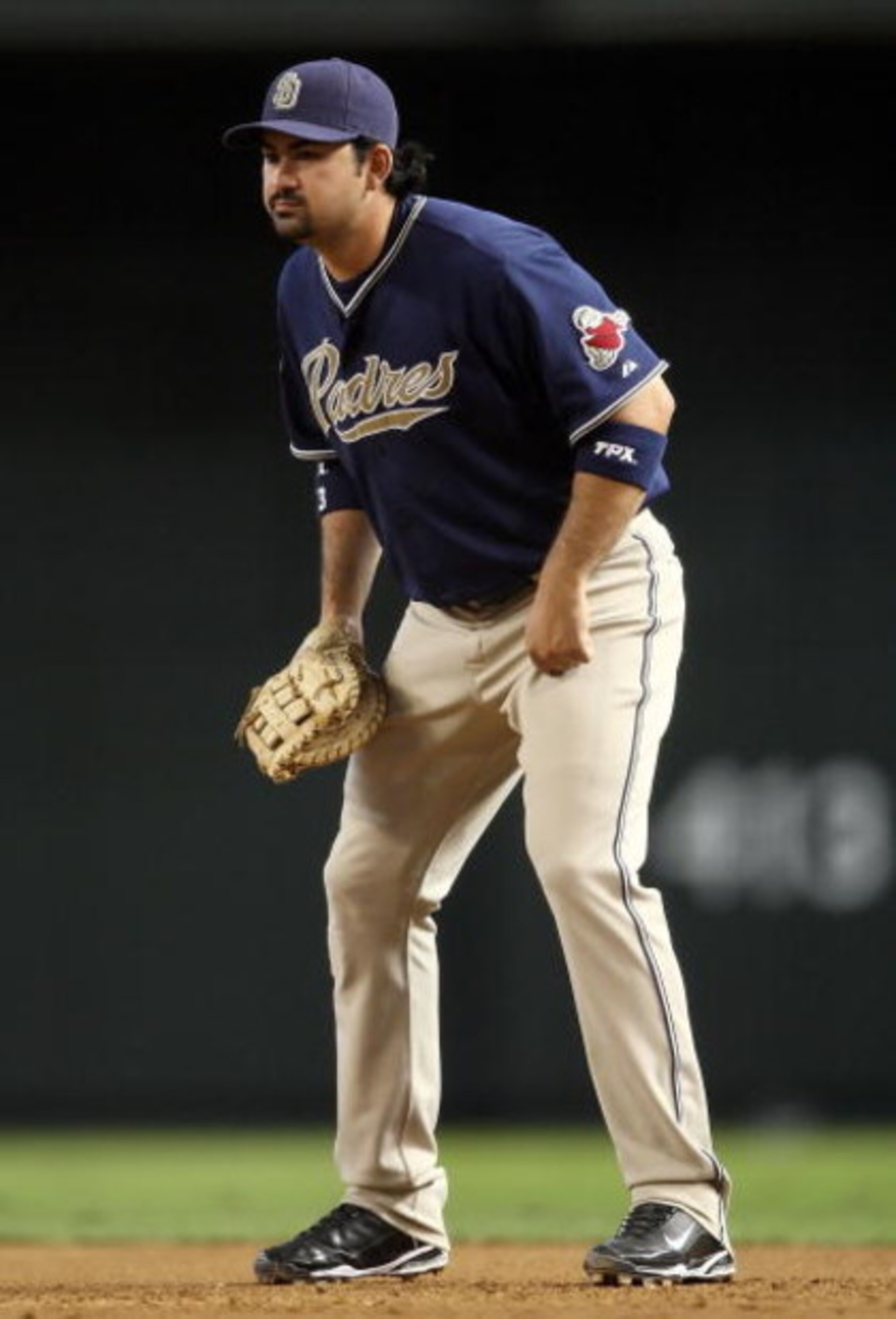 PHOENIX - JULY 08:  Infielder Adrian Gonzalez #23 of the San Diego Padres in action during the major league baseball game against the Arizona Diamondbacks at Chase Field on July 8, 2009 in Phoenix, Arizona. The Diamondbacks defeated the Padres 6-2.  (Phot