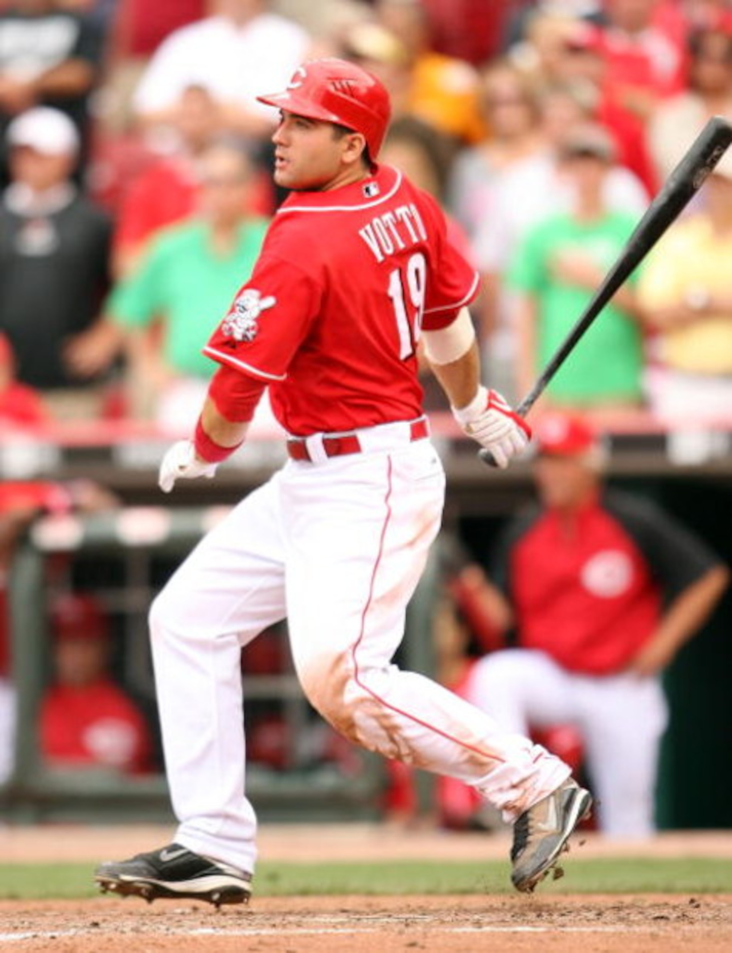 CINCINNATI - JULY 02:  Joey Votto #19 of the Cincinnati Reds hits a single to bring in the game winning run in the 10th inning during the game against the Arizona Diamondbacks on July 2, 2009 in Cincinnati, Ohio. The Reds won 3-2 in 10 innings.  (Photo by