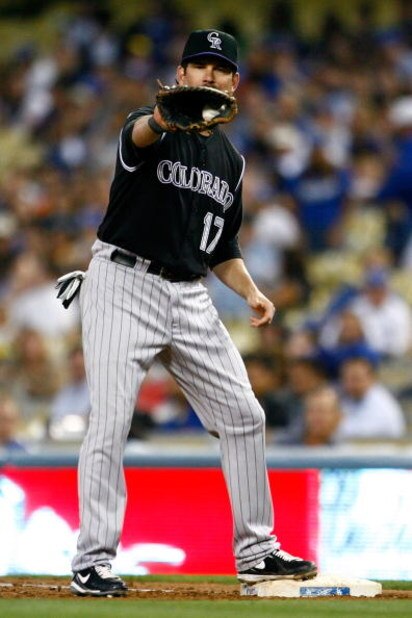 LOS ANGELES, CA - JUNE 30:  Todd Helton #17 of the Colorado Rockies catches the ball at first base for an out against the Los Angeles Dodgers at Dodger Stadium on June 30, 2009 in Los Angeles, California.  (Photo by Jeff Gross/Getty Images)