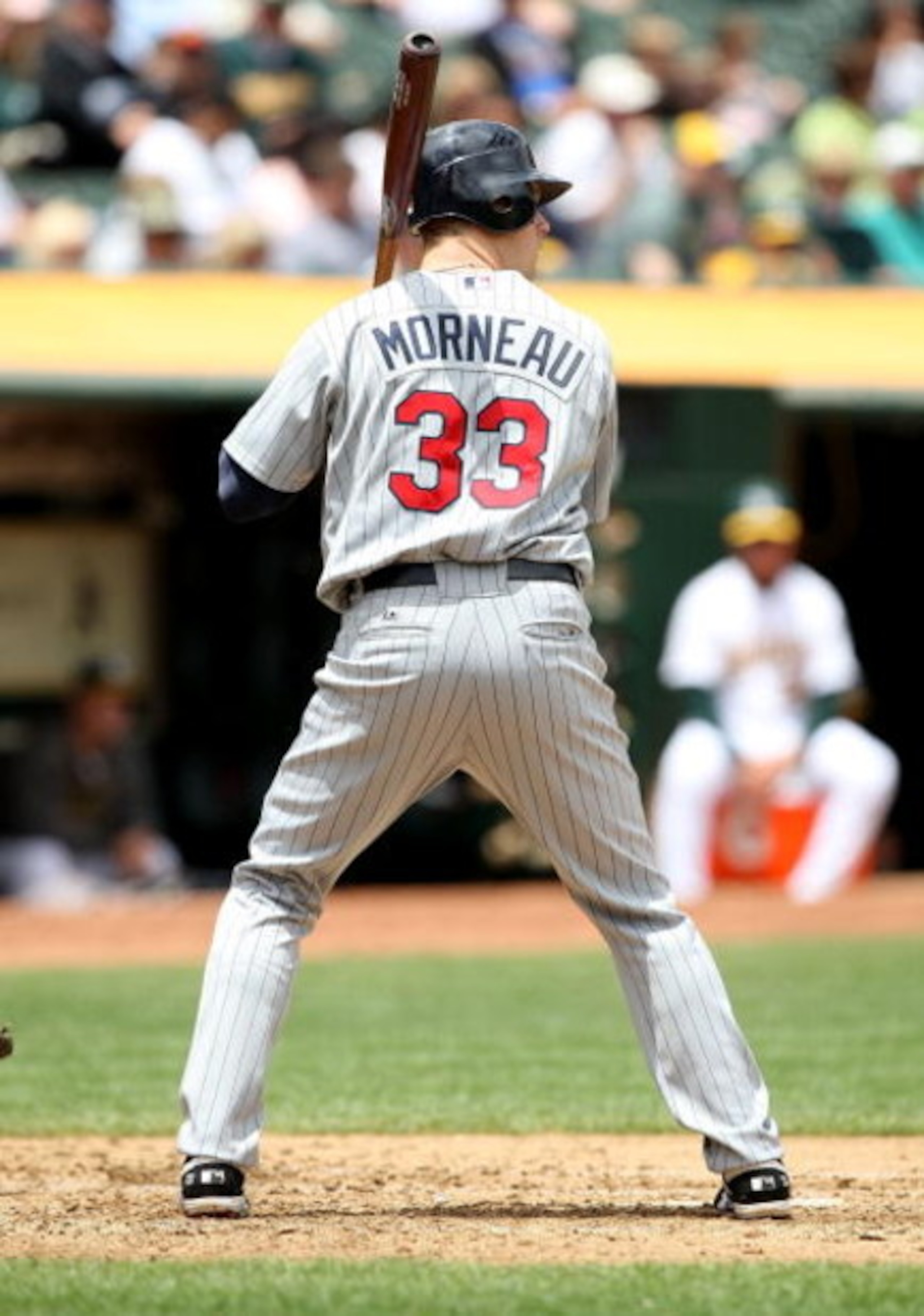 OAKLAND, CA - JUNE 11:  Justin Morneau #33 of the Minnesota Twins bats against the Oakland Athletics during a Major League Baseball game on June 11, 2009 at the Oakland Coliseum in Oakland, California.  (Photo by Jed Jacobsohn/Getty Images)