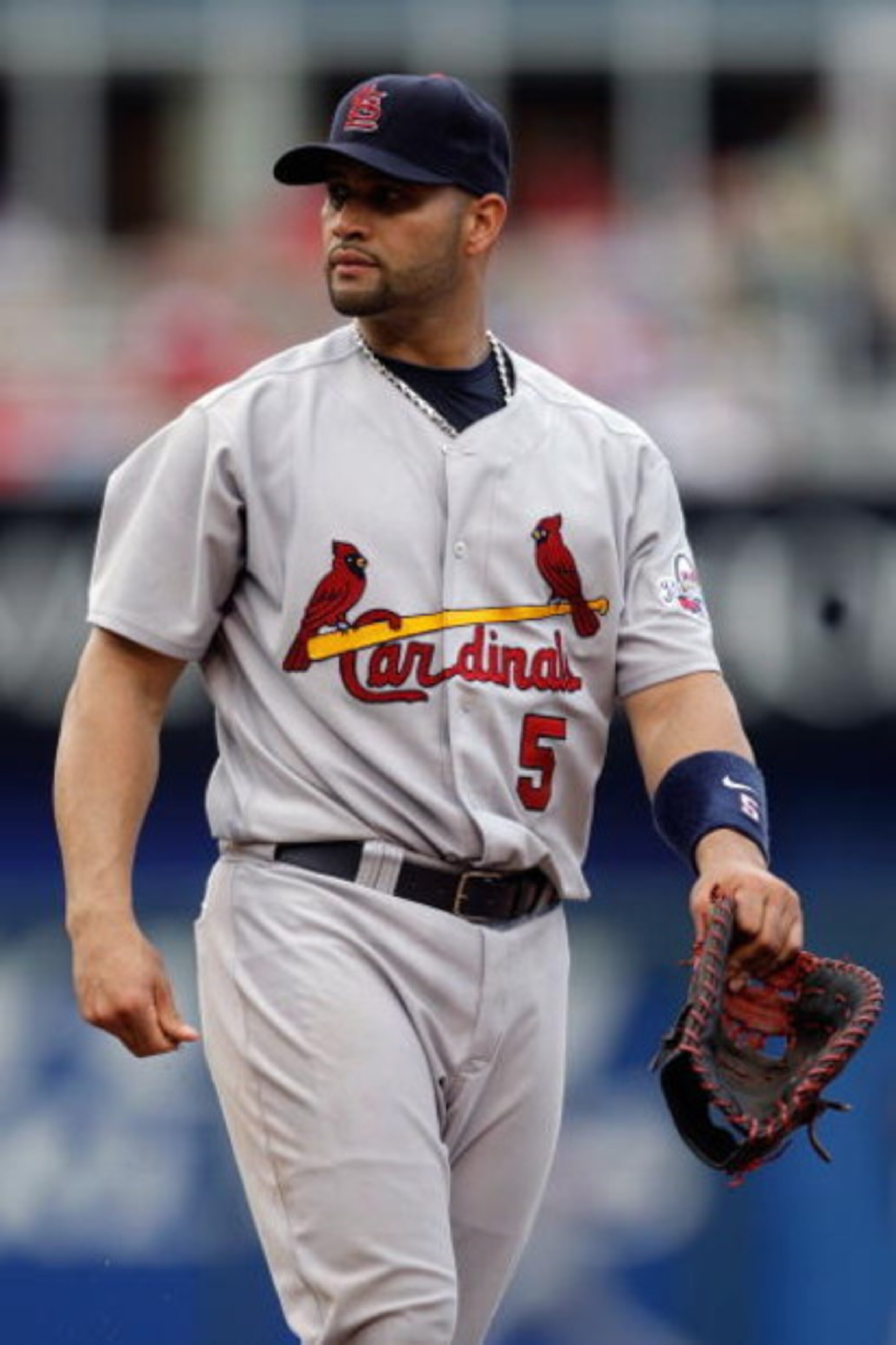 KANSAS CITY, MO - JUNE 20:  Albert Pujols #5 of the St. Louis Cardinals looks on against the Kansas City Royals during the game on June 20, 2009 at Kauffman Stadium in Kansas City, Missouri. (Photo by Jamie Squire/Getty Images)
