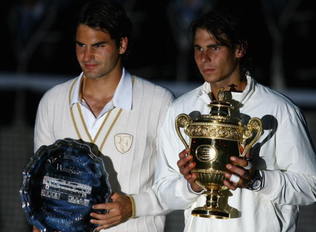 LONDON - JULY 06: Rafael Nadal of Spain and Roger Federer of Switzerland pose for pictures with after Nadal won in five sets in the final on day thirteen of the Wimbledon Lawn Tennis Championships at the All England Lawn Tennis and Croquet Club on July 6 LONDON - JULY 06: Rafael Nadal of Spain and Roger Federer of Switzerland pose for pictures with after Nadal won in five sets in the final on day thirteen of the Wimbledon Lawn Tennis Championships at the All England Lawn Tennis and Croquet Club on July 6