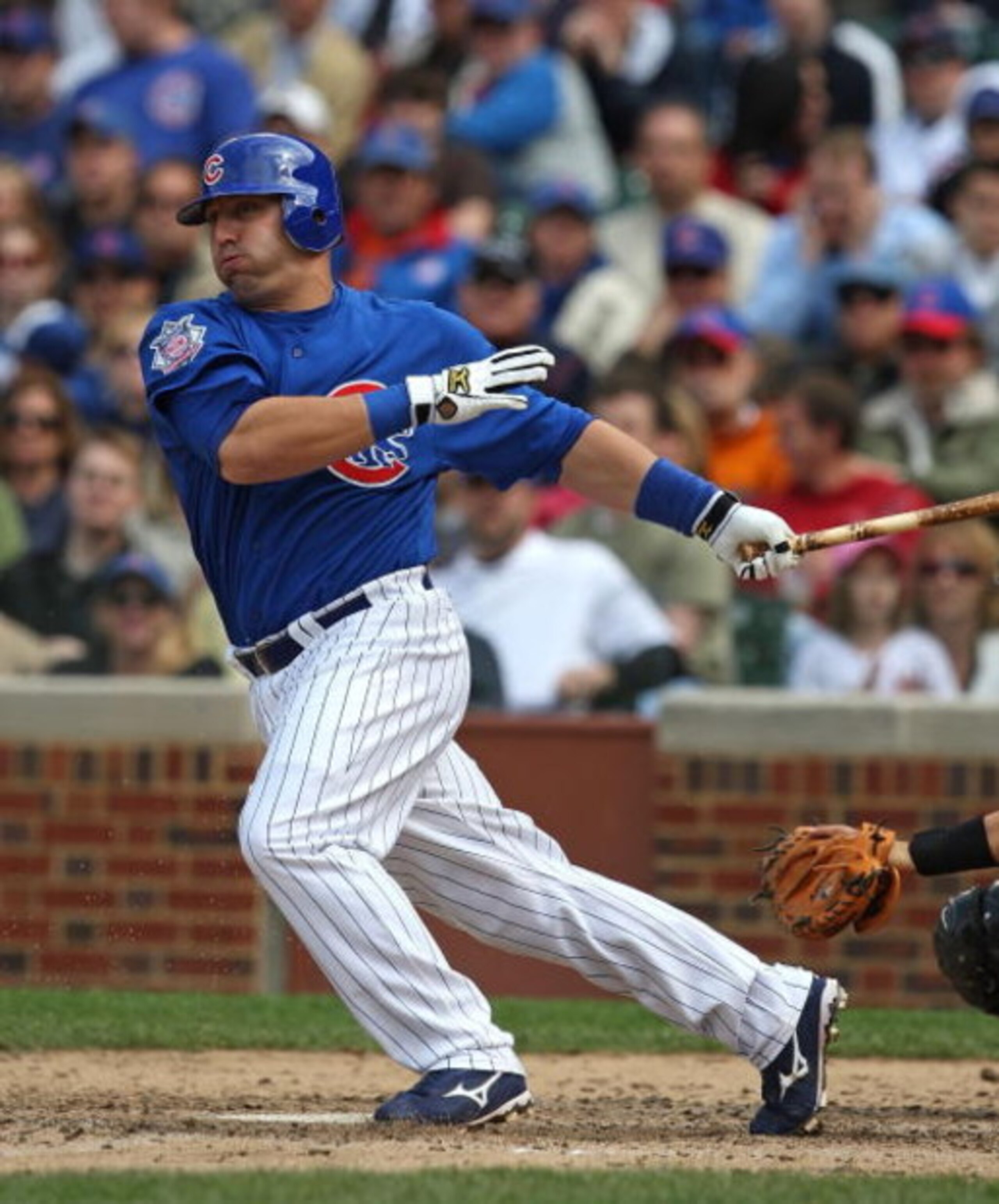 CHICAGO - MAY 27: Jake Fox #5 of the Chicago Cubs hits the ball against the Pittsburgh Pirates on May 27, 2009 at Wrigley Field in Chicago, Illinois. The Cubs defeated the Pirates 5-2. (Photo by Jonathan Daniel/Getty Images)