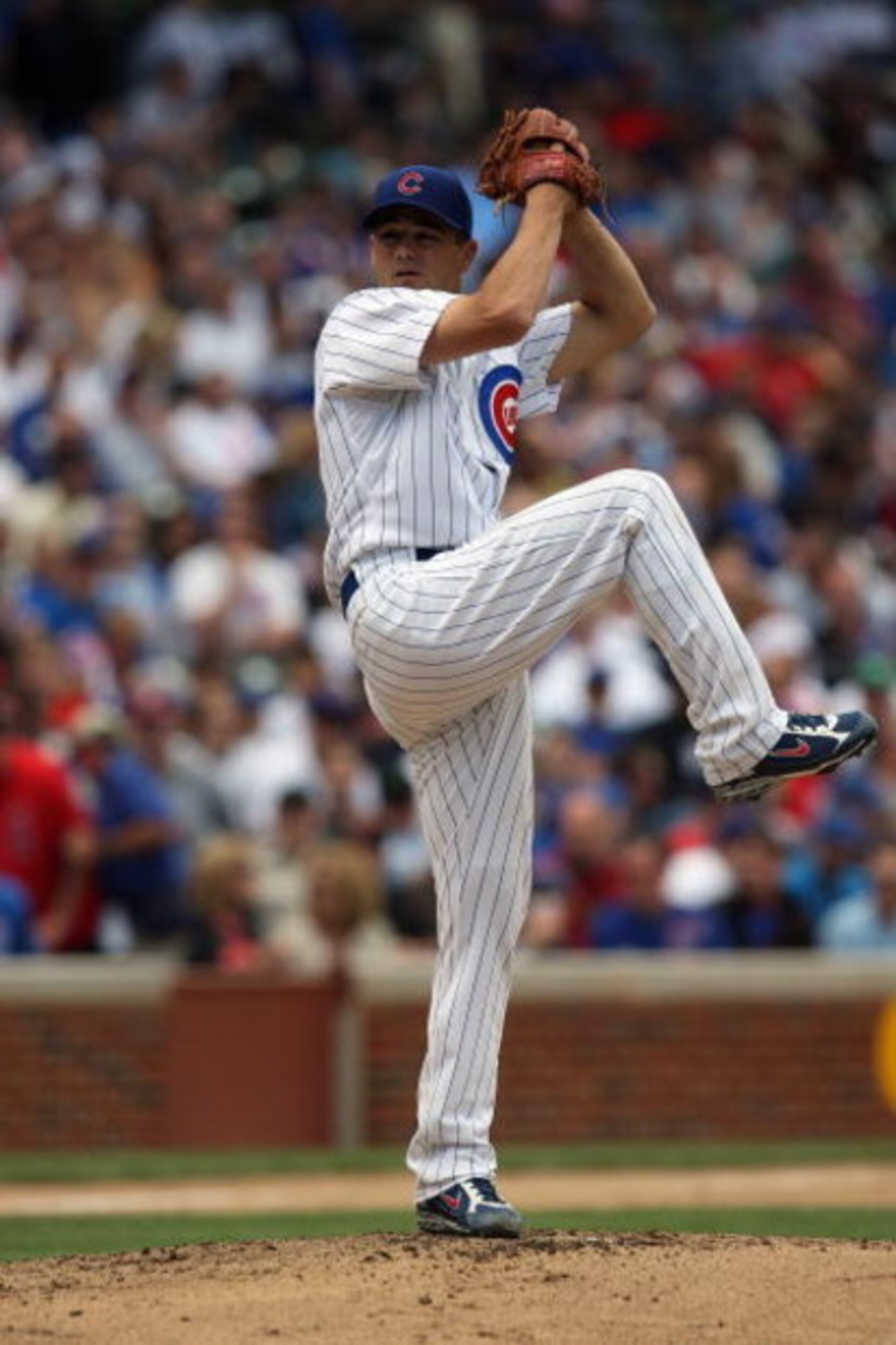 CHICAGO - MAY 29:  Ted Lilly #30 of the Chicago Cubs pitches against the Los Angeles Dodgers during the game on May 29, 2009 at Wrigley Field in Chicago, Illinois. (Photo by Jonathan Daniel/Getty Images) 