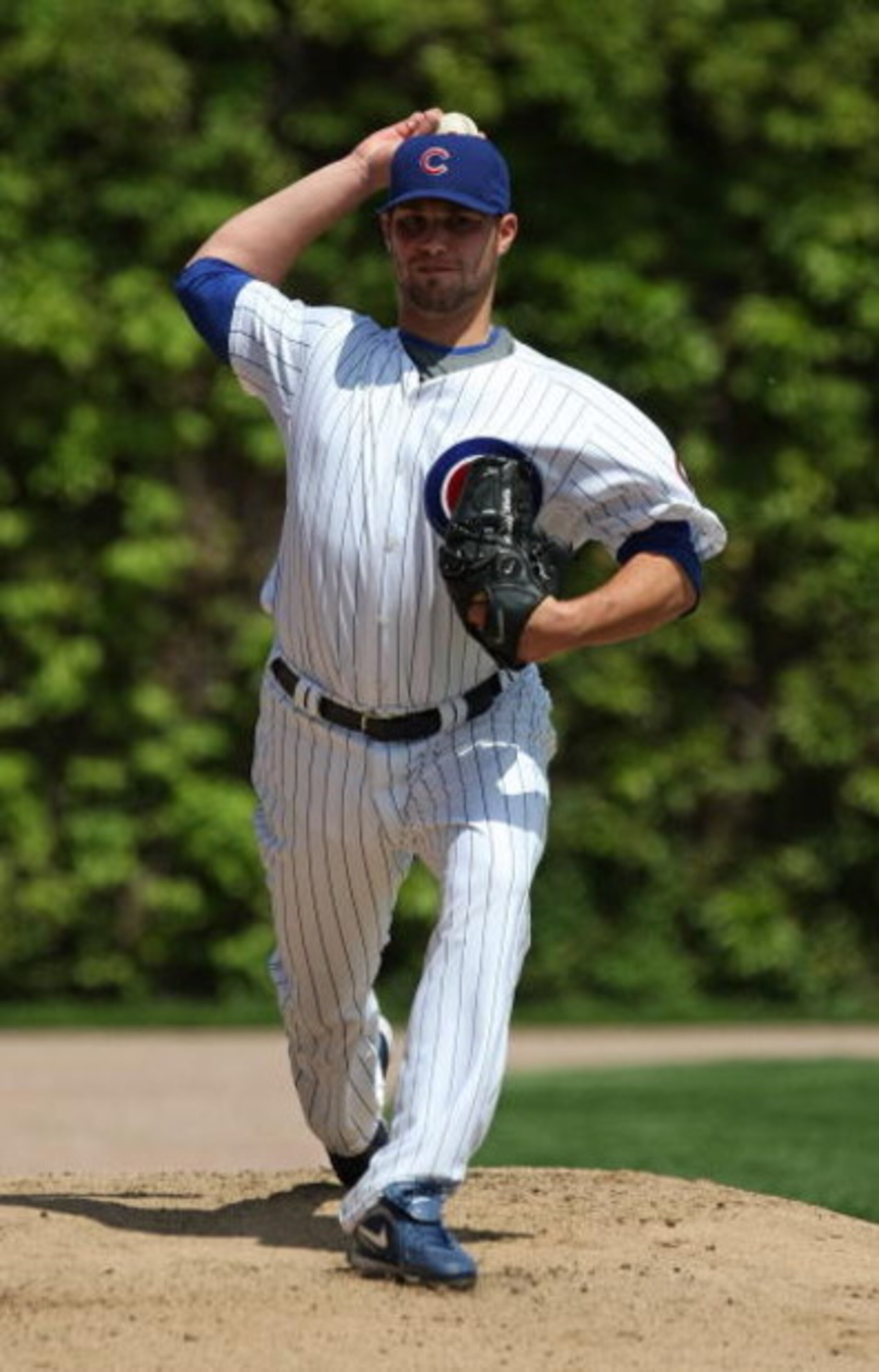 CHICAGO - MAY 16: Starting pitcher Randy Wells #36 of the Chicago Cubs warms-up in the bullpen before a game against the Houston Astros on May 16, 2009 at Wrigley Field in Chicago, Illinois. The Cubs defeated the Astros 5-4. (Photo by Jonathan Daniel/Gett
