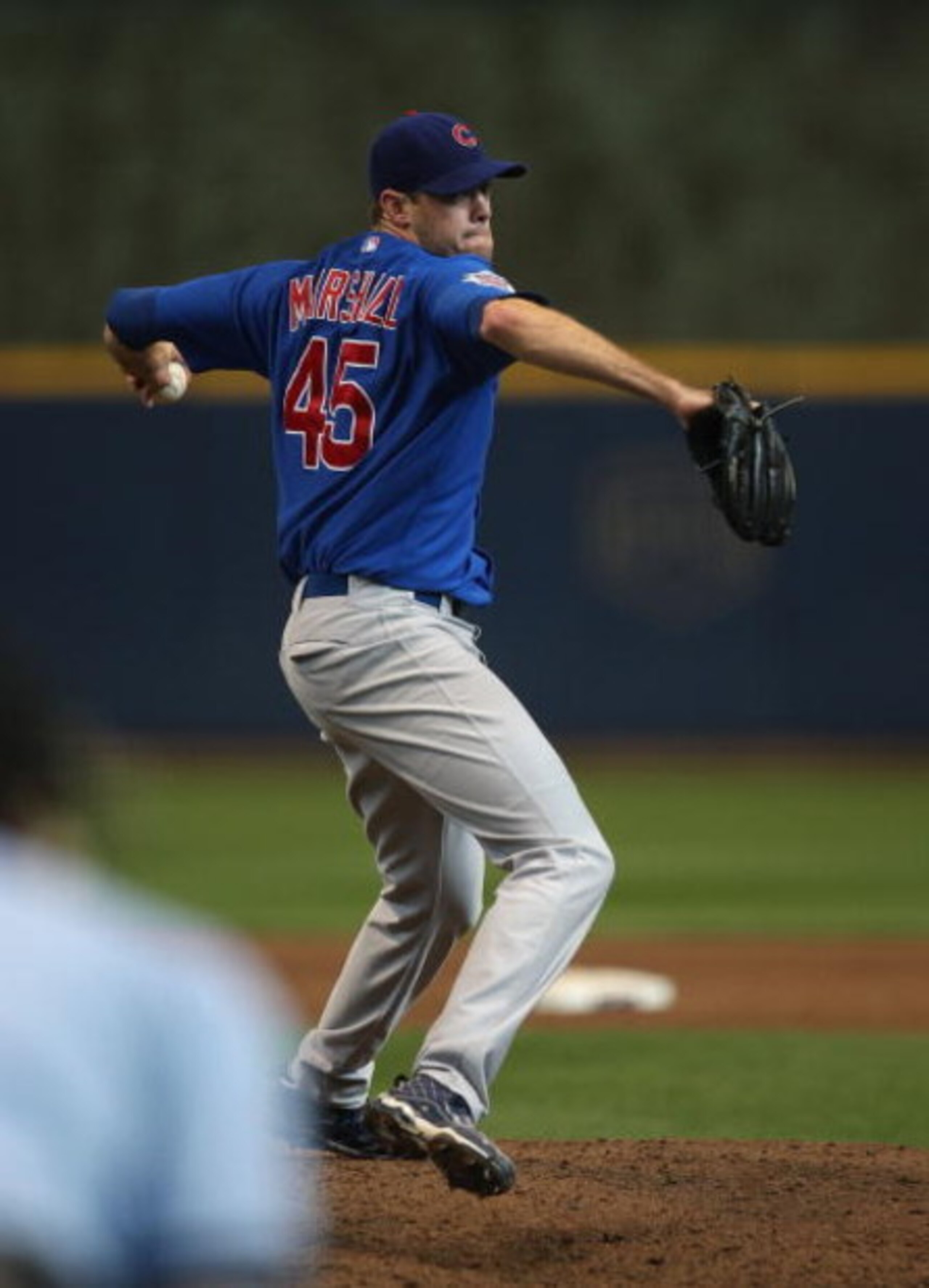 MILWAUKEE - MAY 10: Sean Marshall #45 of the Chicago Cubs delivers the ball against the Milwaukee Brewers on May 10, 2009 at Miller Park in Milwaukee, Wisconsin. The Cubs defeated the Brewers 4-2.  (Photo by Jonathan Daniel/Getty Images)