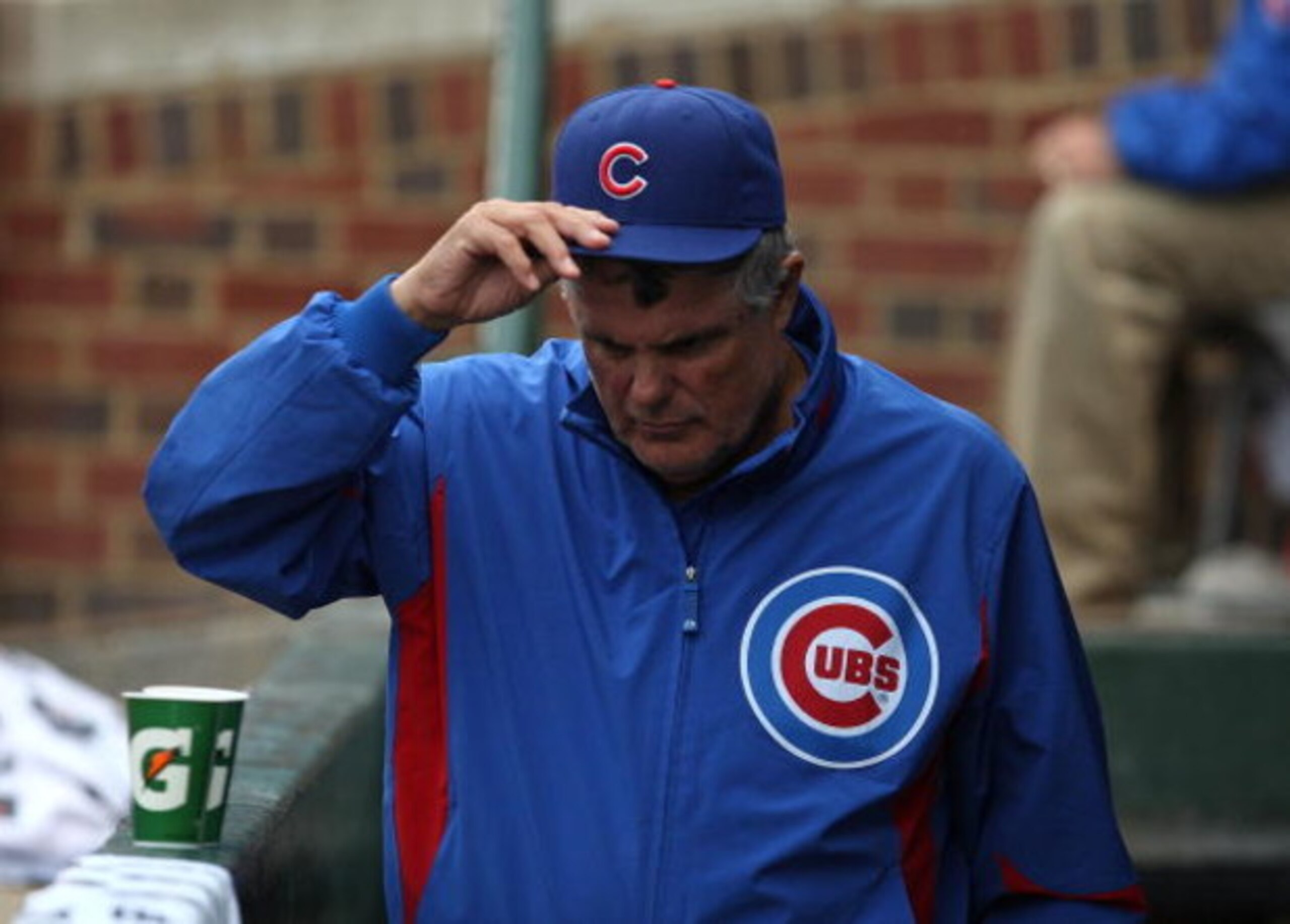 CHICAGO - JULY 08: Manager Lou Piniella #41 of the Chicago Cubs paces in the dugout during a game against the Atlanta Braves on July 8, 2009 at Wrigley Field in Chicago, Illinois. The Braves defeated the Cubs 4-1. (Photo by Jonathan Daniel/Getty Images)