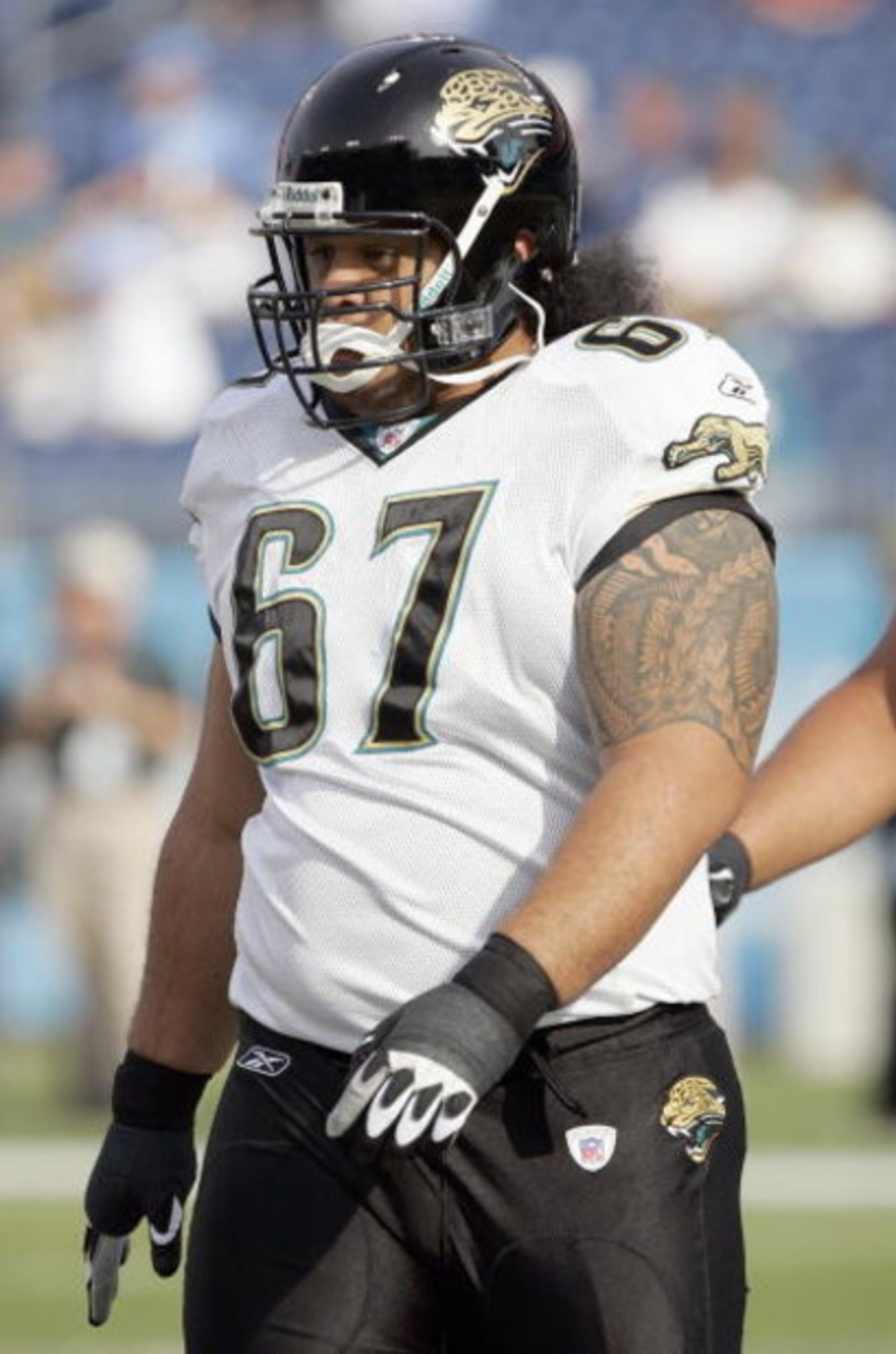 NASHVILLE, TN - DECEMBER 17: Vince Manuwai #67 of the Jacksonville Jaguars walks on the field before the game against the Tennessee Titans on December 17, 2006 at LP Field in Nashville, Tennessee.  The Titans won 24-17.  (Photo by Brian Bahr/Getty Images)