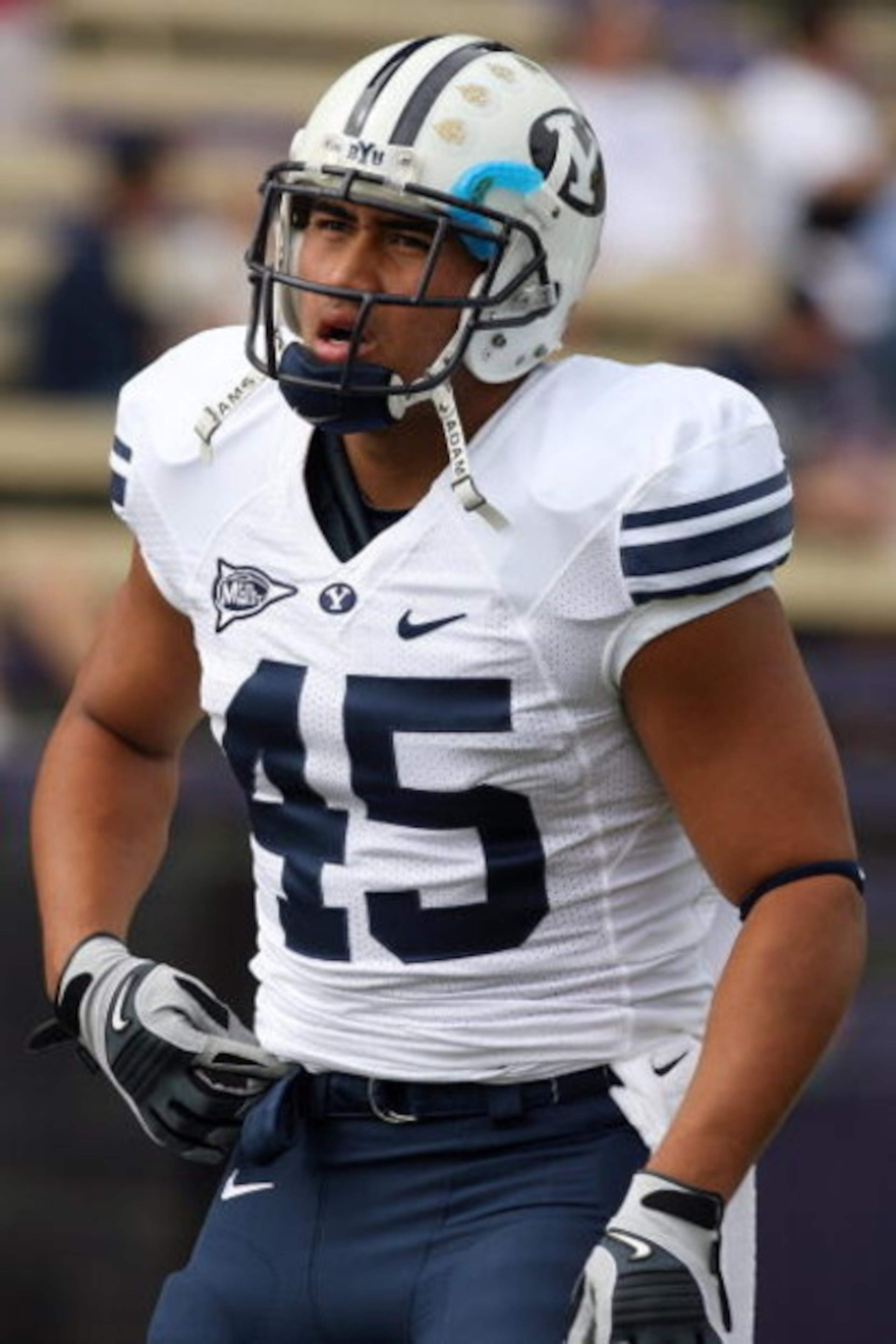 SEATTLE - SEPTEMBER 6:  Harvey Unga #45 of the BYU Cougars warms up prior to their game against the Washington Huskies on September 6, 2008 at Husky Stadium in Seattle, Washington. The Cougars defeated the Huskies 28-27. (Photo by Otto Greule Jr/Getty Ima