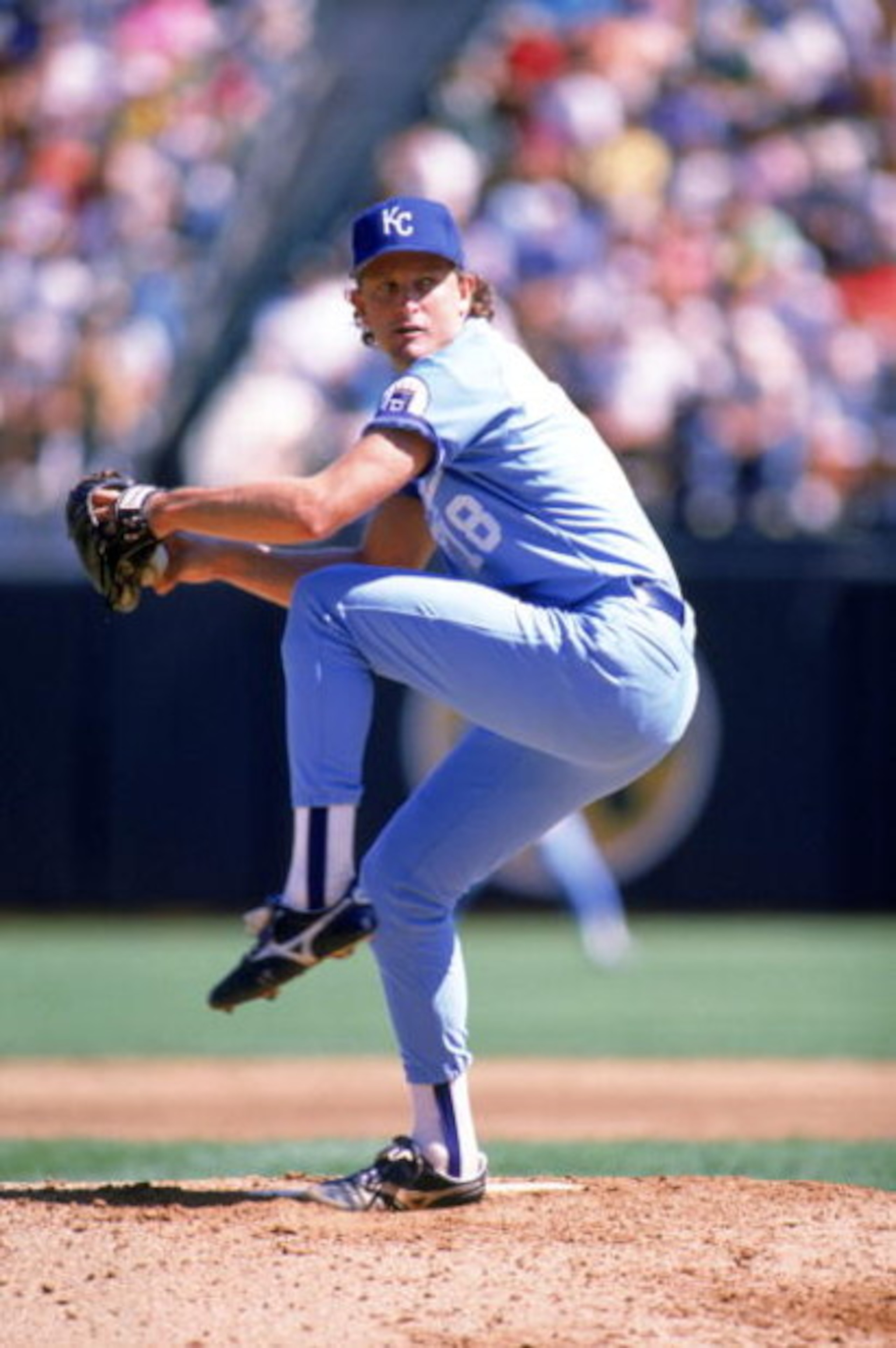 OAKLAND, CA - 1989:  Bret Saberhagen #31 of the Kansas City Royals winds up for a pitch during a game against the Oakland Athletics at Oakland-Alameda County Coliseum in 1989 in Oakland, California.  (Photo by Otto Greule Jr/Getty Images)