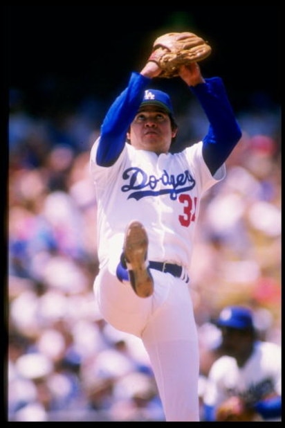 Pitcher Fernando Valenzuela of the Los Angeles Dodgers prepares to throw the ball during a game against the Houston Astros at Dodger Stadium in Los Angeles, California.