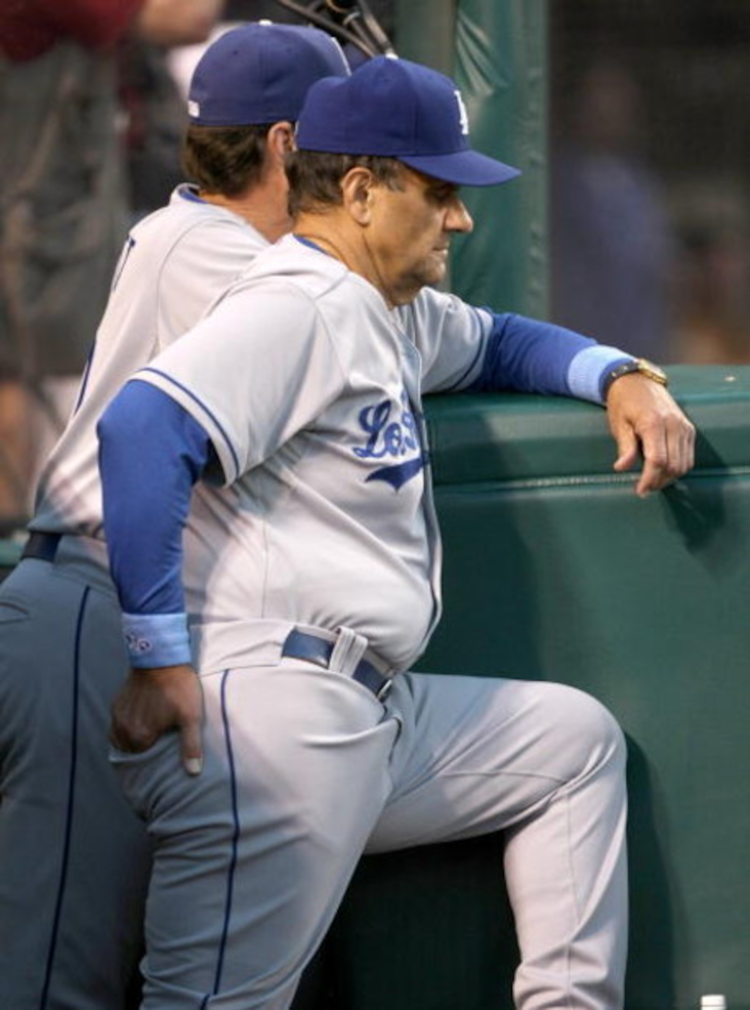 ANAHEIM, CA - JUNE 21:   Manager Joe Torre of the Los Angeles Dodgers  looks on from the dugout during the game with the Los Angeles Angels of Anaheim on June 21, 2009 at Angel Stadium in Anaheim, California.   The Dodgers won 5-3. (Photo by Stephen Dunn/
