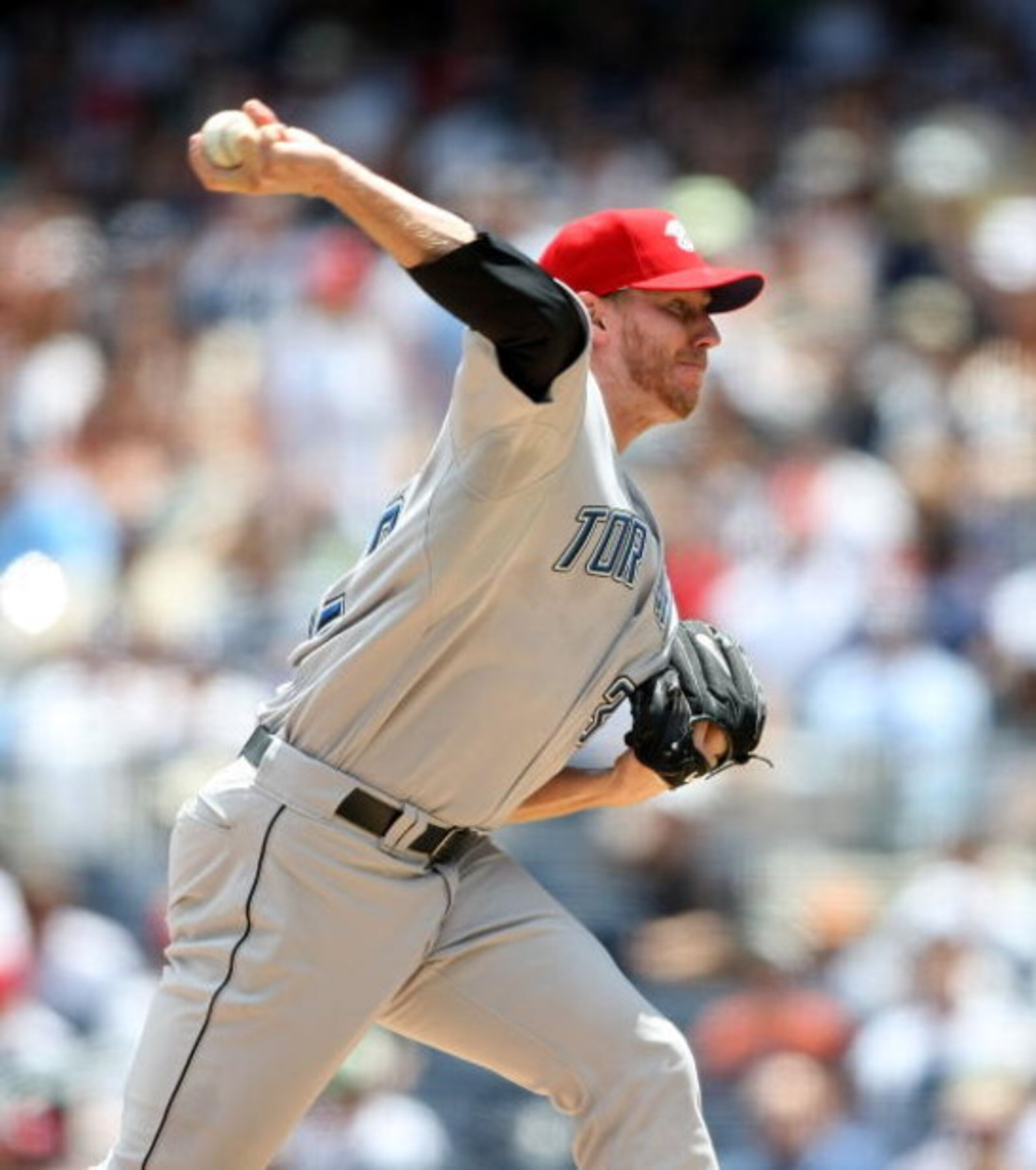 NEW YORK - JULY 04:  Roy Halladay #32 of the Toronto Blue Jays pitches against the New York Yankees on July 4, 2009 at Yankee Stadium in the Bronx borough of New York City.  (Photo by Nick Laham/Getty Images)