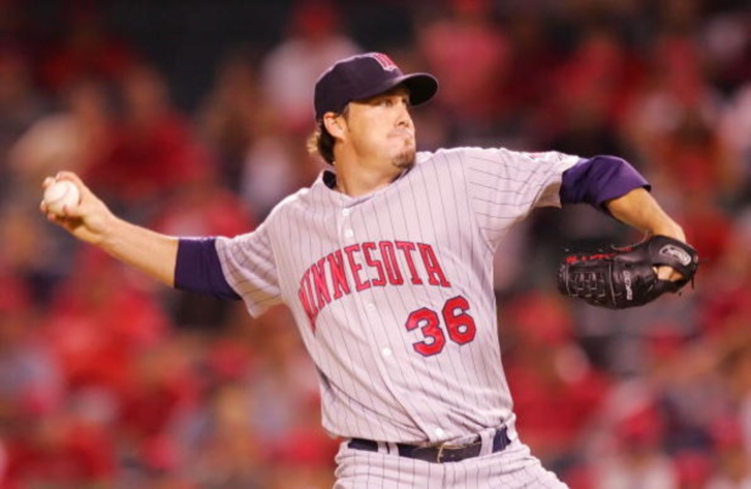 ANAHEIM, CA - AUGUST 21:  Joe Nathan #36 of the Minnesota Twins pitches in the 12th inning against the Los Angeles Angels of Anaheim at Angels Stadium on August 21, 2008 in Anaheim, California.  (Photo by Lisa Blumenfeld/Getty Images)