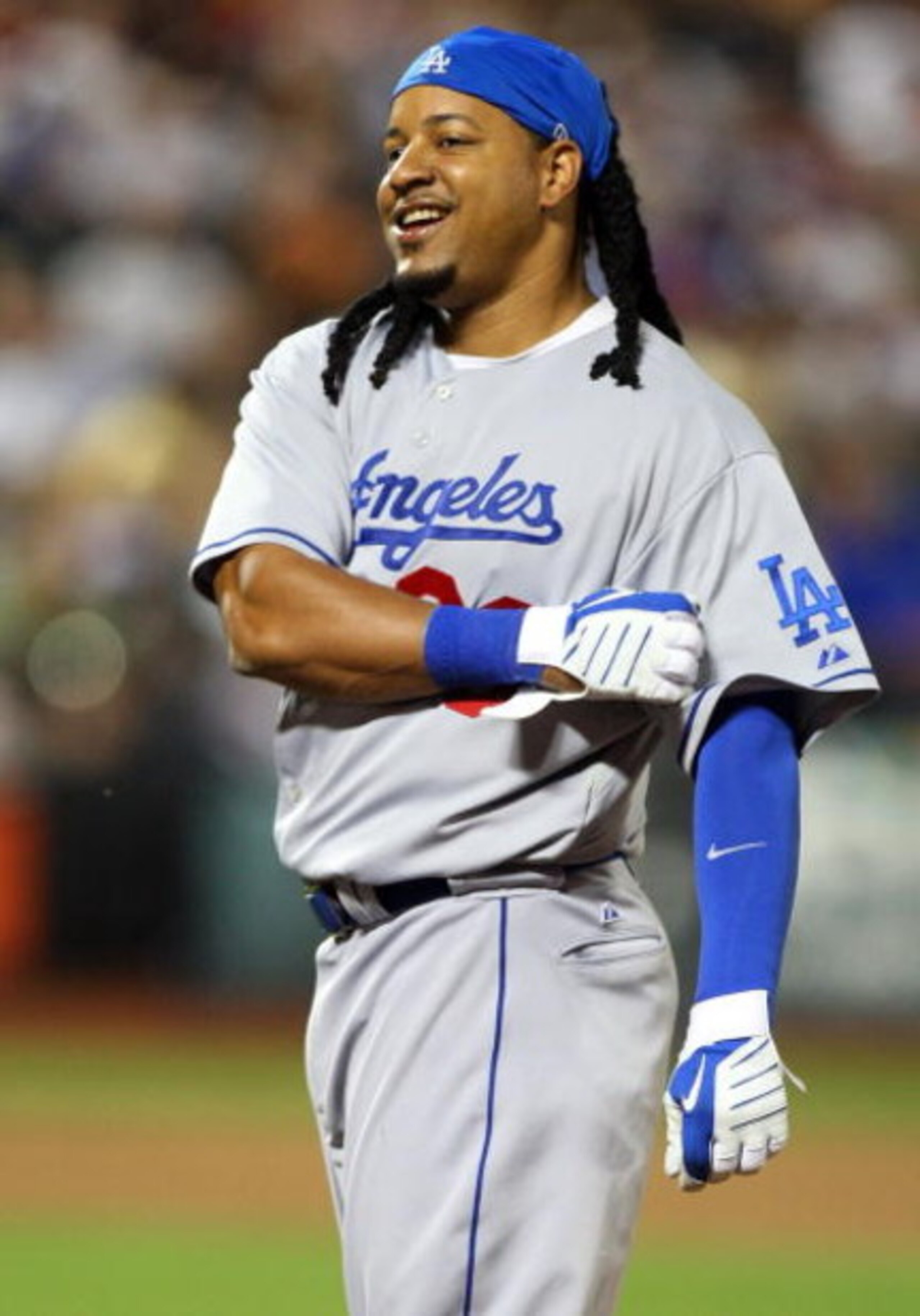 NEW YORK - JULY 08:  Manny Ramirez #99 of the Los Angeles Dodgers looks on after grounding out to end the sixth inning against the New York Mets on July 8, 2009 at Citi Field in the Flushing neighborhood of the Queens borough of New York City.  (Photo by 