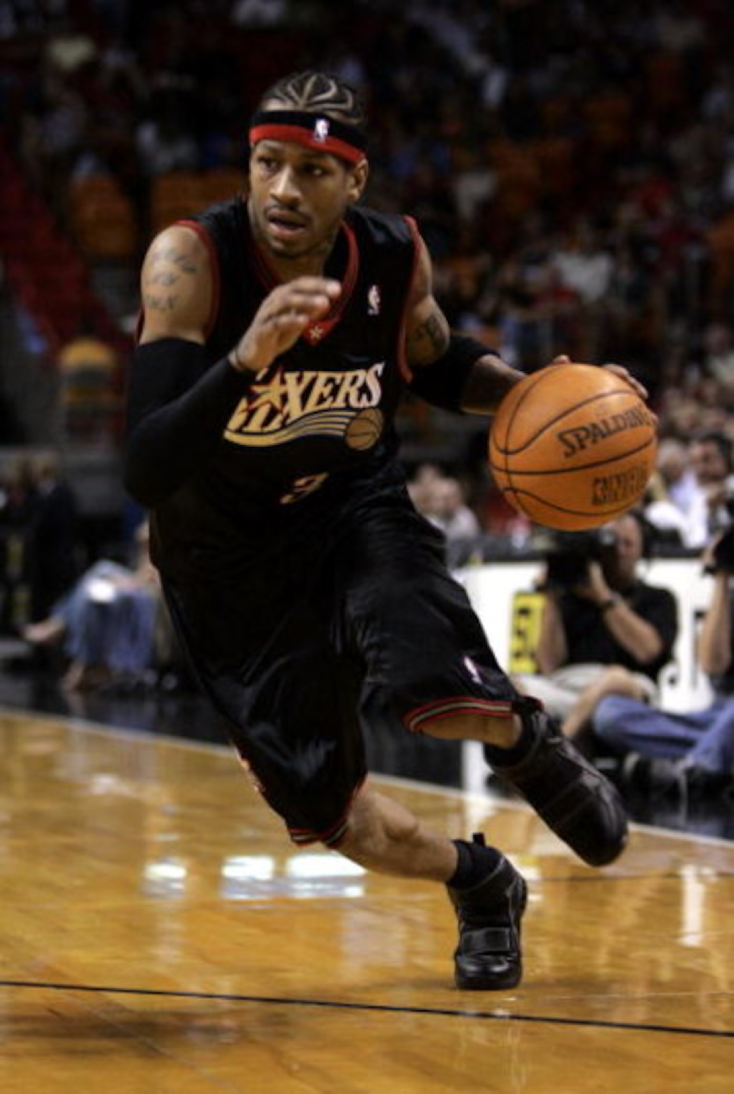 MIAMI - NOVEMBER 18: Guard Allen Iverson #3 of the Philadelphia 76ers drives to the basket against the Miami Heat  on November 18, 2005 at the American Airlines Arena in Miami  Florida. NOTE TO USER: User expressly acknowledges and agrees that, by downloa