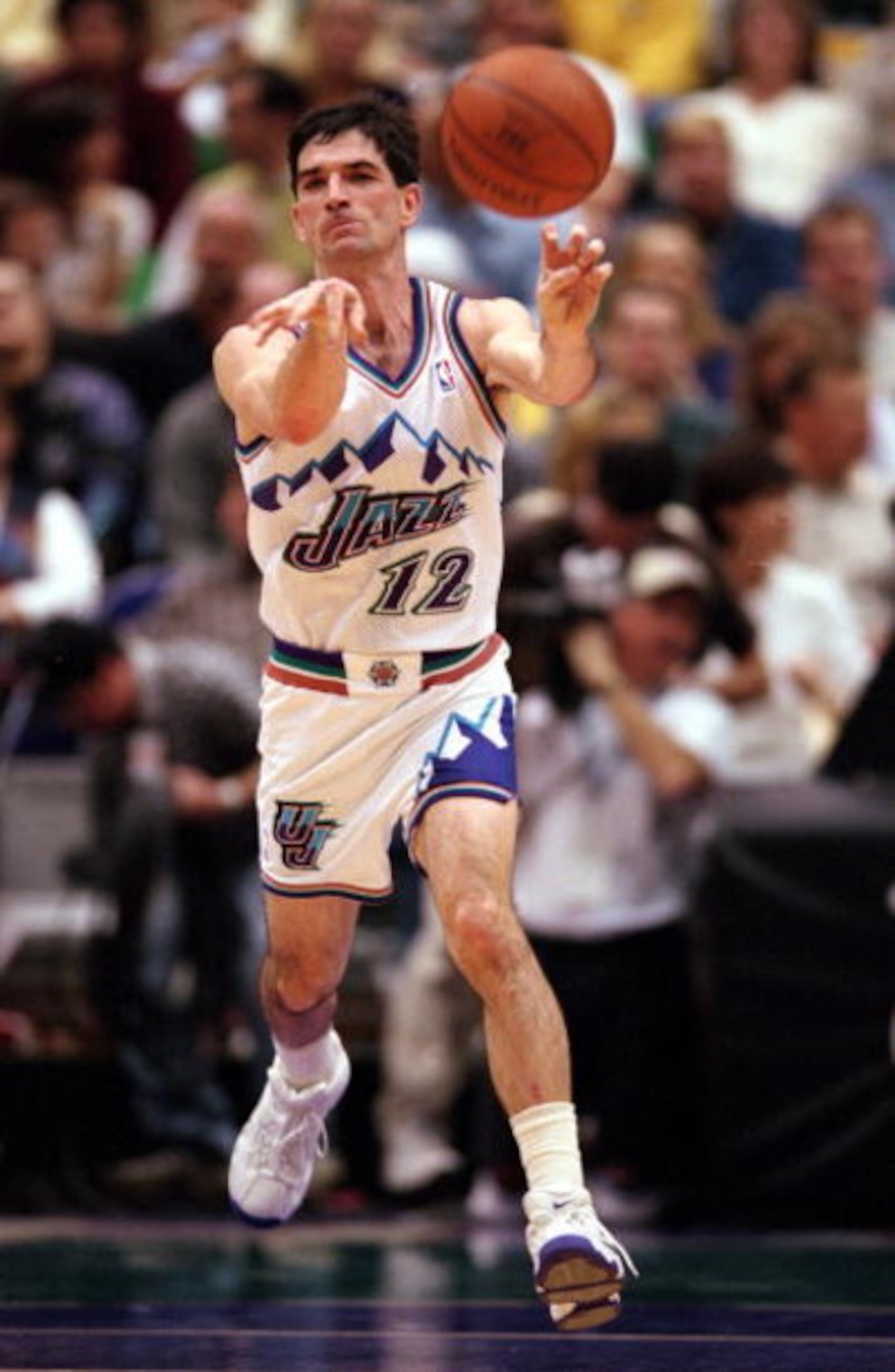 27 Mar 2000: John Stockton #12 of the Utah Jazz  passes the ball during a game against the Dallas Mavericks at the Delta Center in Salt Lake City, Utah. The Mavericks defeated the Jazz 113-105.    Mandatory Credit: Otto Greule Jr.  /Allsport
