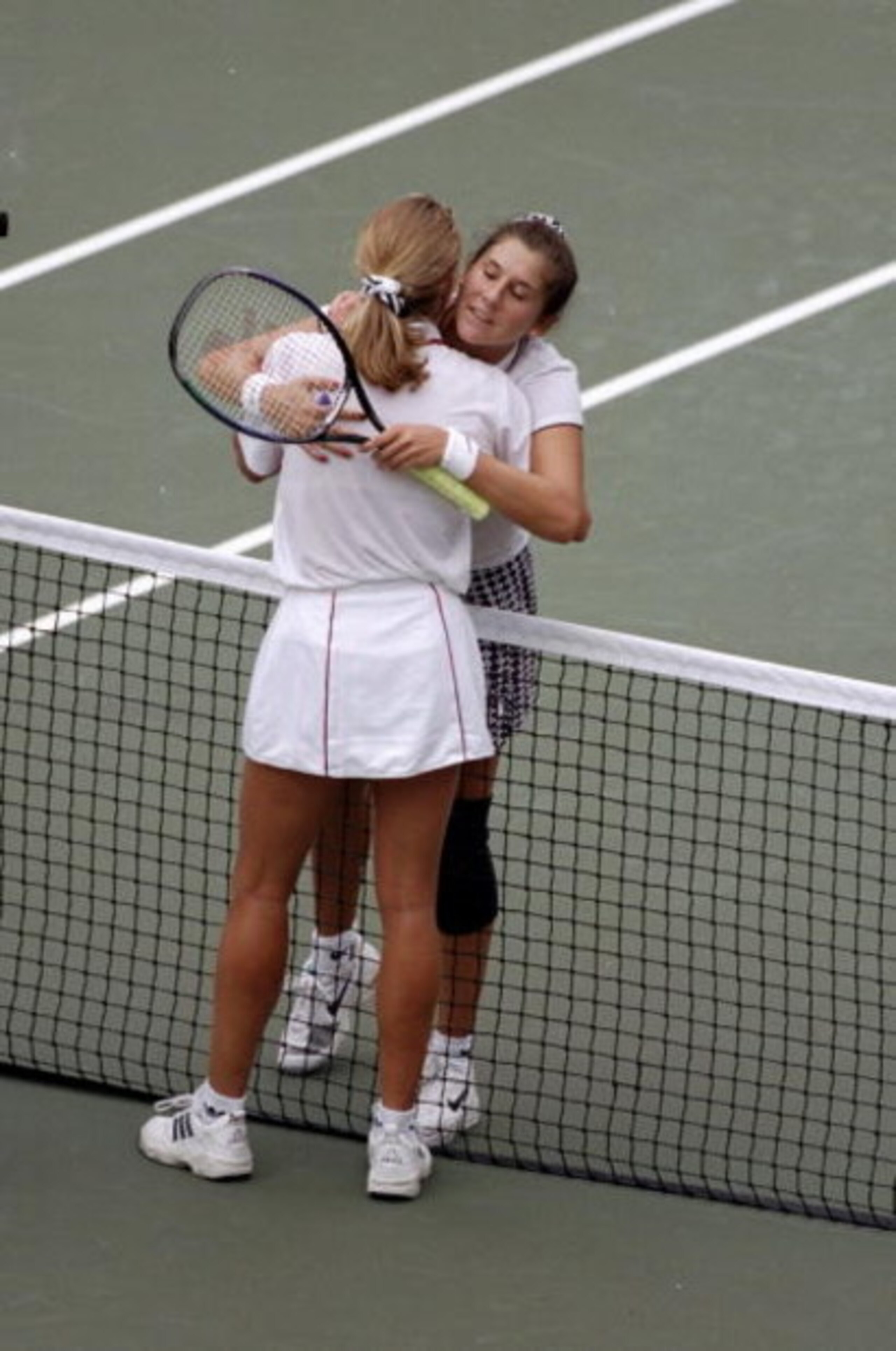 9 Sep 1995:  Steffi Graf of Germany hugs Monica Seles of the USA after the Womens Singles Final match during the 1995 US Open Tournament played at Flushing Meadow in New York, USA.  Steffi Graf won the match. \ Mandatory Credit: Gary  Prior/Allsport