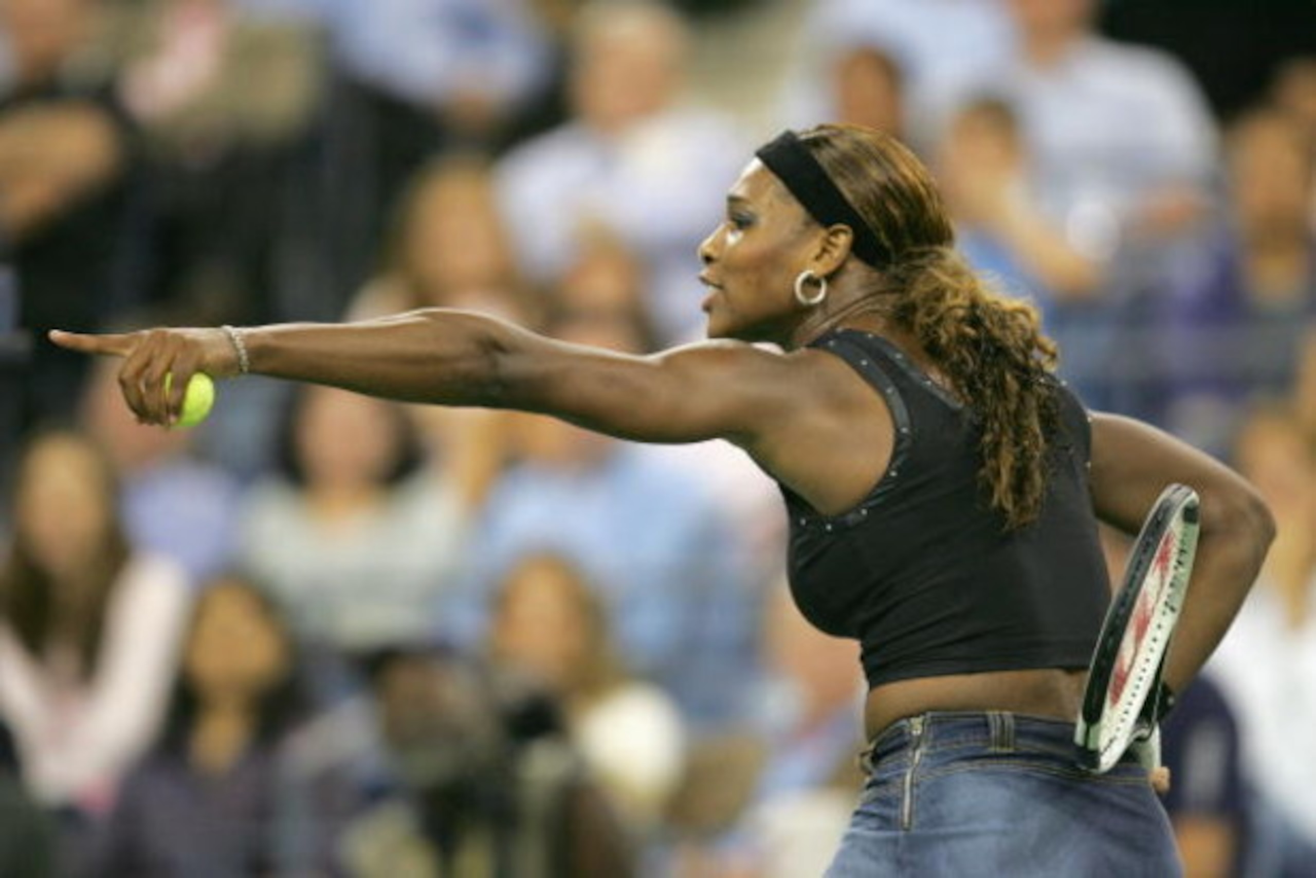 NEW YORK - SEPTEMBER 7:  Serena Williams argues a call against Jennifer Capriati during the US Open September 7, 2004 at the USTA National Tennis Center in Flushing Meadows Corona Park in the Flushing neighborhood of the Queens borough of New York. Capria