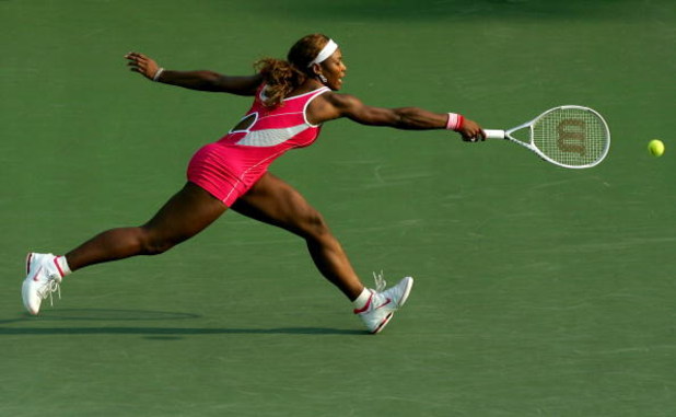KEY BISCAYNE, FL - MARCH 27:  Serena Williams of the USA reaches to return to Shahar Peer of Isreal during the NASDAQ-100 Open at the Crandon Park Tennis Center on March 27, 2005 in Key Biscayne, Florida.  Williams won in straight sets. (Photo by Ezra Sha
