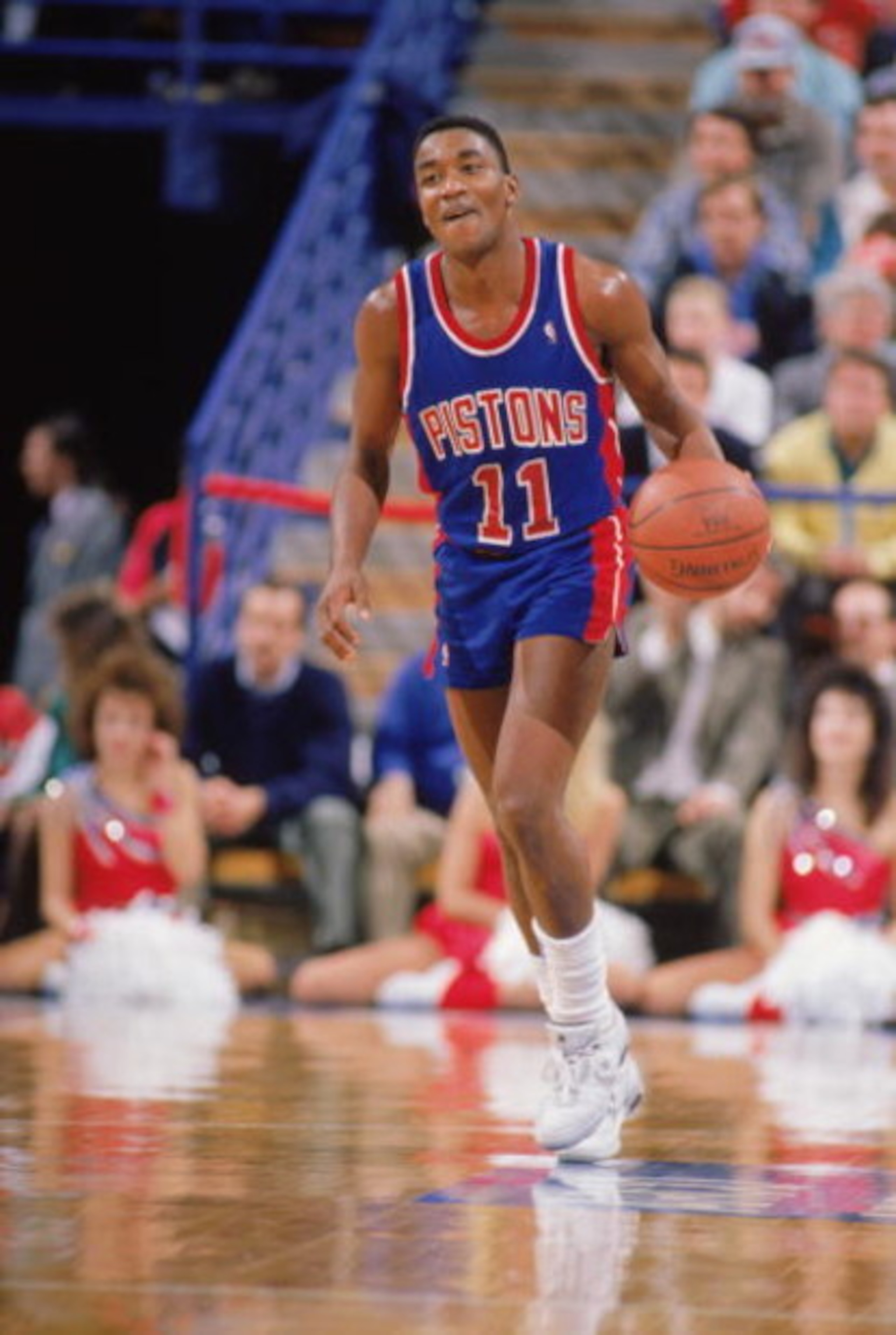 1988:  Isiah Thomas #11 of the Detroit Pistons advances the ball during a game in the 1988-1989 NBA season. (Photo by Otto Greule/Getty Images)