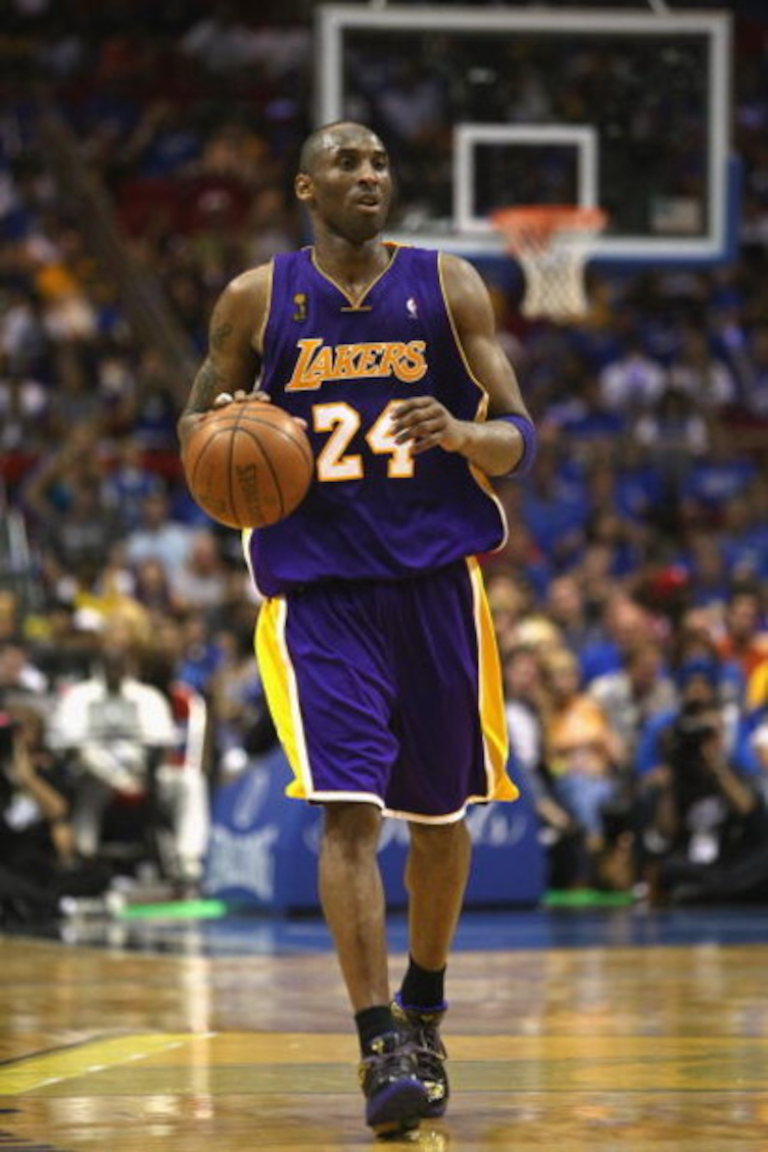 ORLANDO, FL - JUNE 14:  Kobe Bryant #24 of the Los Angeles Lakers moves the ball against the Orlando Magic in Game Five of the 2009 NBA Finals on June 14, 2009 at Amway Arena in Orlando, Florida. The Lakers won 99-86. NOTE TO USER:  User expressly acknowl