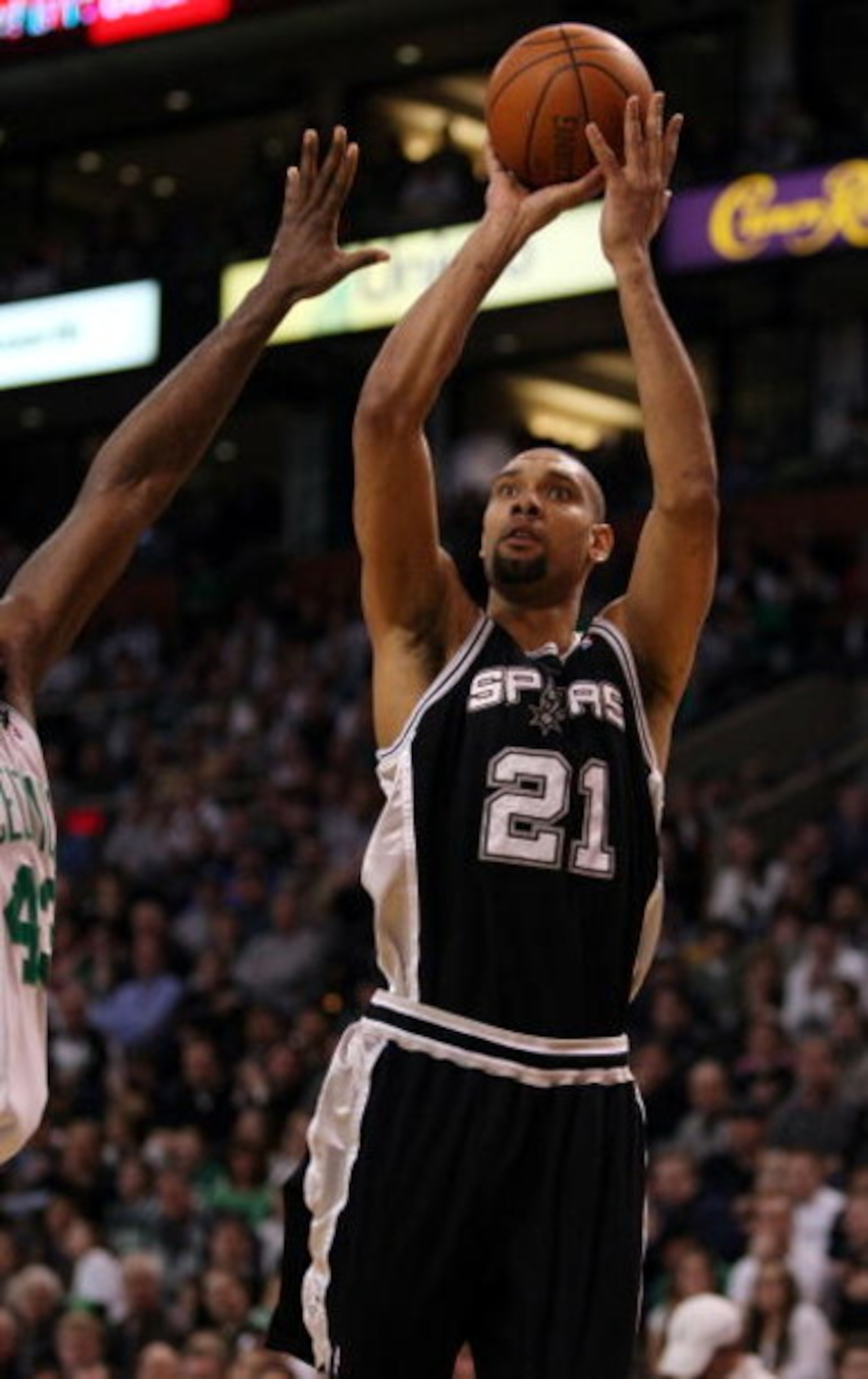 BOSTON - FEBRUARY 08:  Tim Duncan #21 of the San Antonio Spurs takes a shot in the second half against the Boston Celtics on February 8, 2009 at TD Banknorth Garden in Boston, Massachusetts. The Spurs defeated the Celtics 105-99. NOTE TO USER: User expres
