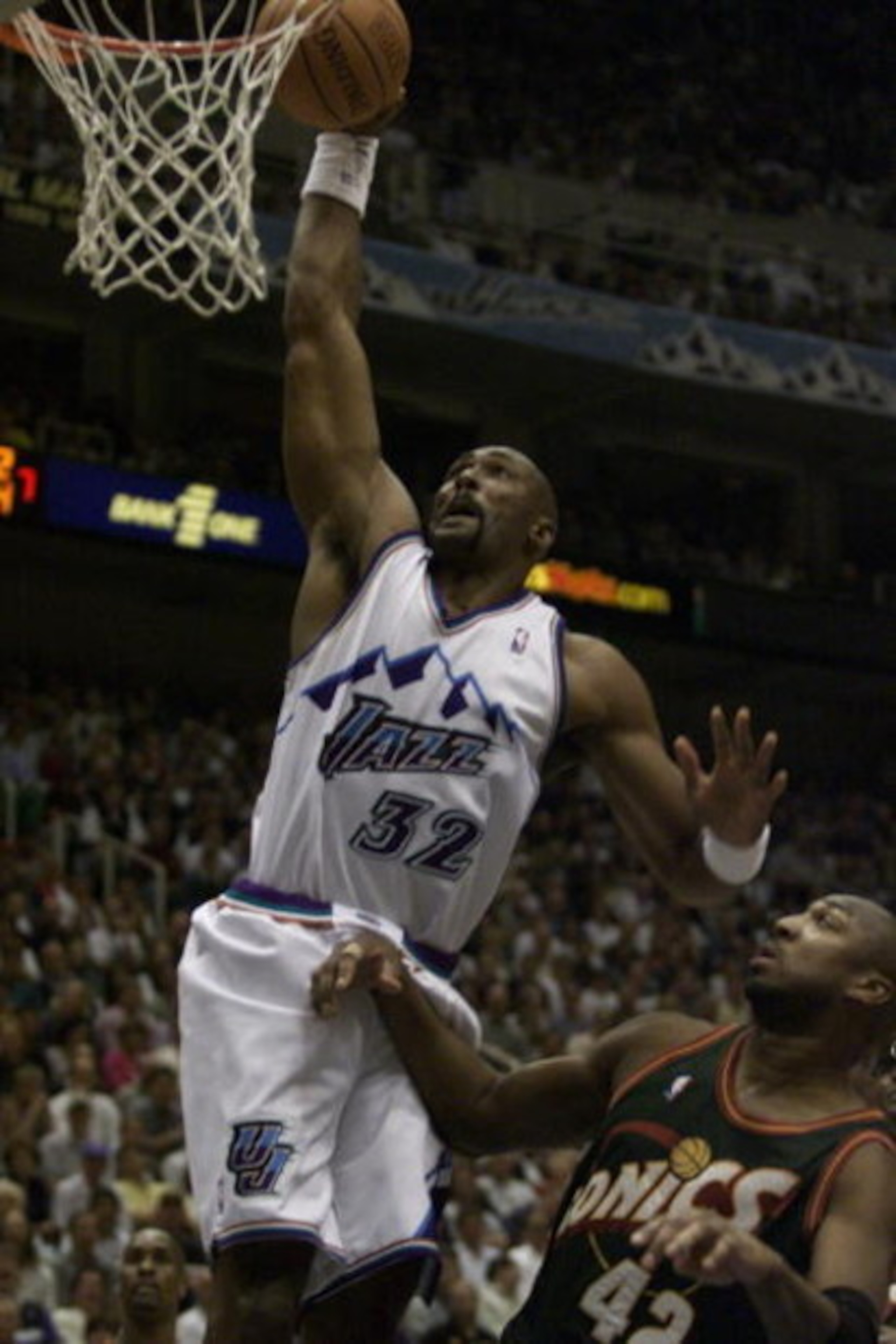 24 Apr 2000:   Karl Malone #32 of the Utah Jazz dunks on Vin Baker #42 of the Seattle Sonics during game 2 of the Western Conference NBA Playoffs at the Delta Center in Salt Lake City, Utah. DIGITAL IMAGE. Mandatory Credit: Jed Jacobsohn/ALLSPORT