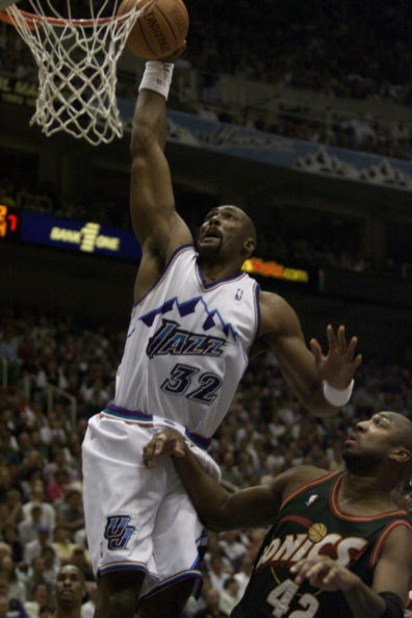 24 Apr 2000:   Karl Malone #32 of the Utah Jazz dunks on Vin Baker #42 of the Seattle Sonics during game 2 of the Western Conference NBA Playoffs at the Delta Center in Salt Lake City, Utah. DIGITAL IMAGE. Mandatory Credit: Jed Jacobsohn/ALLSPORT