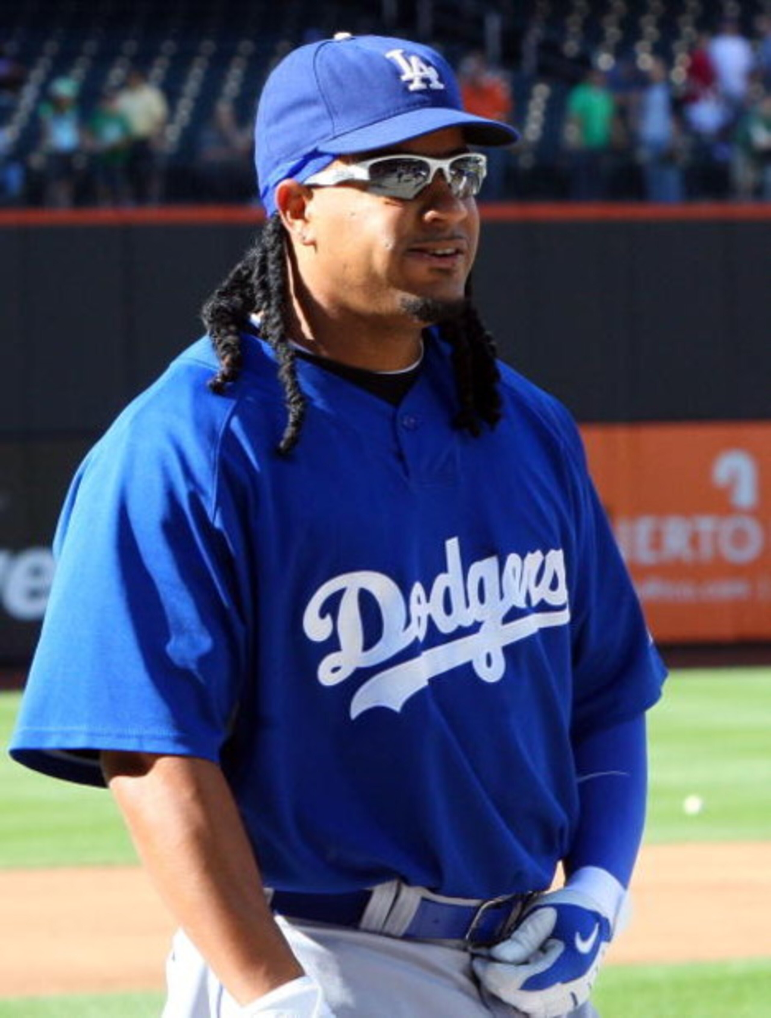 NEW YORK - JULY 08:  Manny Ramirez #99 of the Los Angeles Dodgers looks on during batting practice before playing the New York Mets on July 8, 2009 at Citi Field in the Flushing neighborhood of the Queens borough of New York City.  (Photo by Jim McIsaac/G