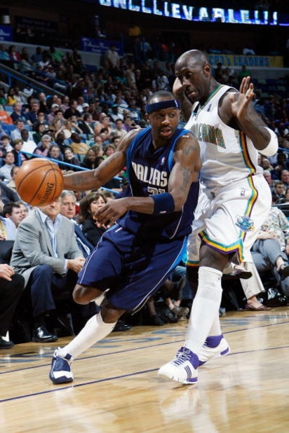 NEW ORLEANS - FEBRUARY 20:  Jason Terry #31 of the Dallas Mavericks drives the ball around Bobby Jackson #8 of the New Orleans Hornets on February 20, 2008 at the New Orleans Arena in New Orleans, Louisiana.  The Hornets defeated the Mavericks 104-93.  NO