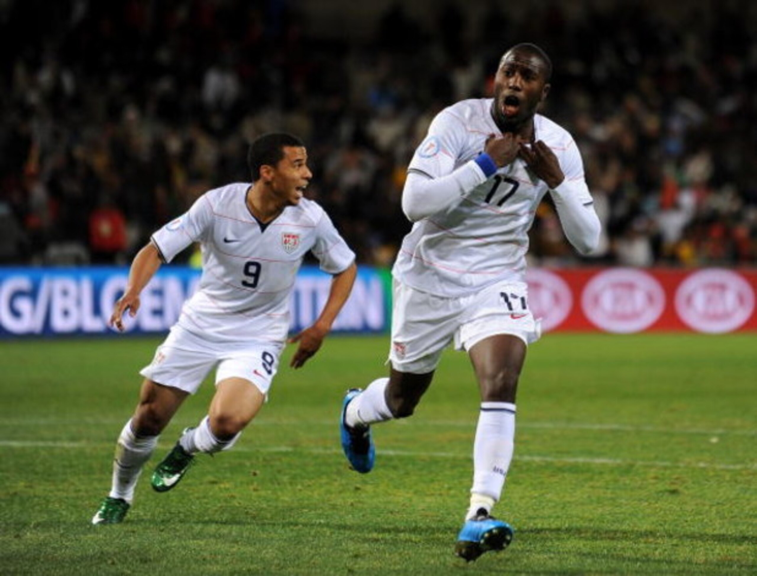 BLOEMFONTEIN, SOUTH AFRICA - JUNE 24:  Jozy Altidore (R) of USA celebrates scoring his sides opening goal with his teammate Charlie Davies during the FIFA Confederations Cup Semi Final match between Spain and USA at Free State Stadium on June 24, 2009 in 