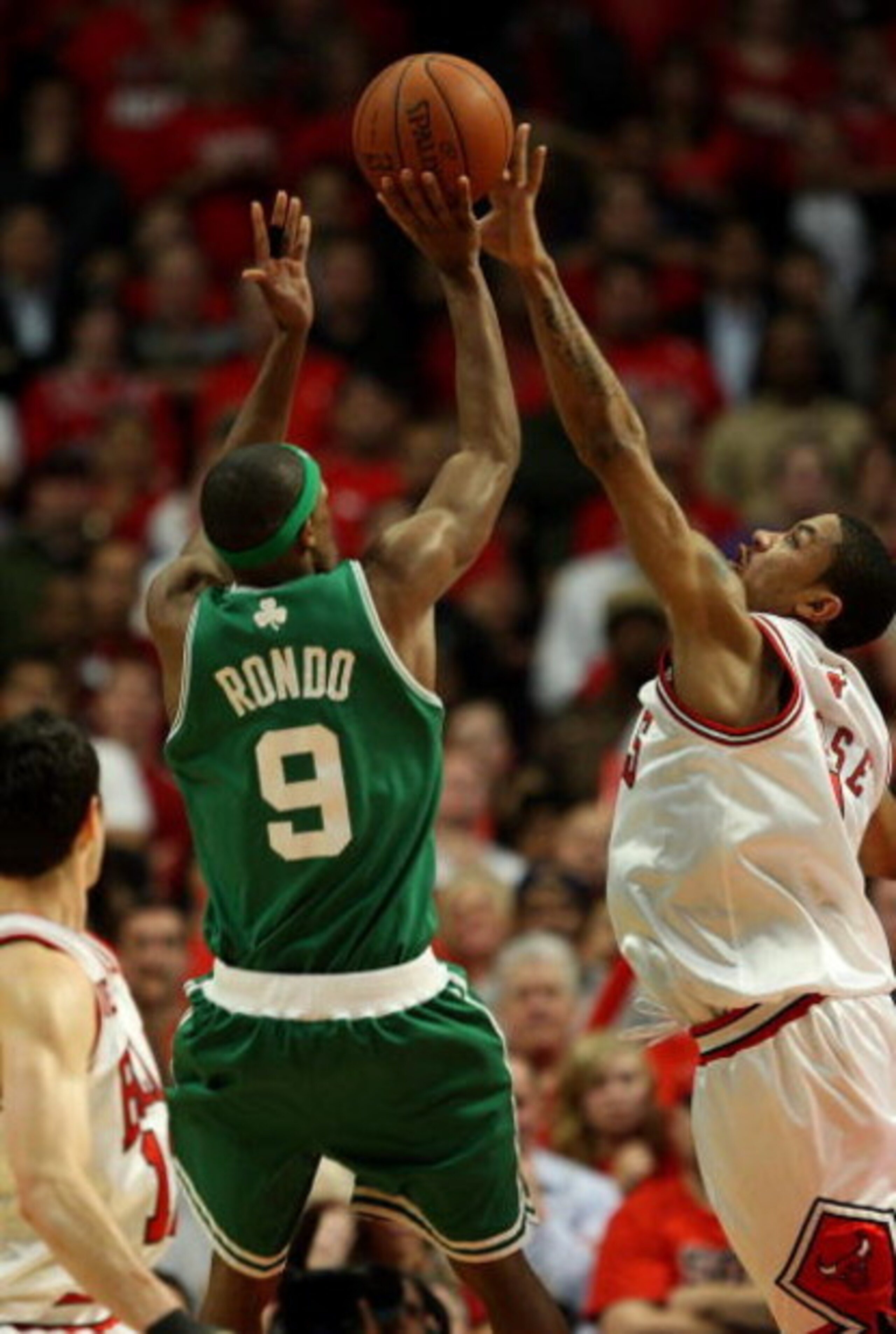 CHICAGO - APRIL 30: Derrick Rose #1 of the Chicago Bulls blocks a shot in the closing seconds of the third overtime period by Rajon Rondo #9 of the Boston Celtics in Game Six of the Eastern Conference Quarterfinals during the 2009 NBA Playoffs at the Unit