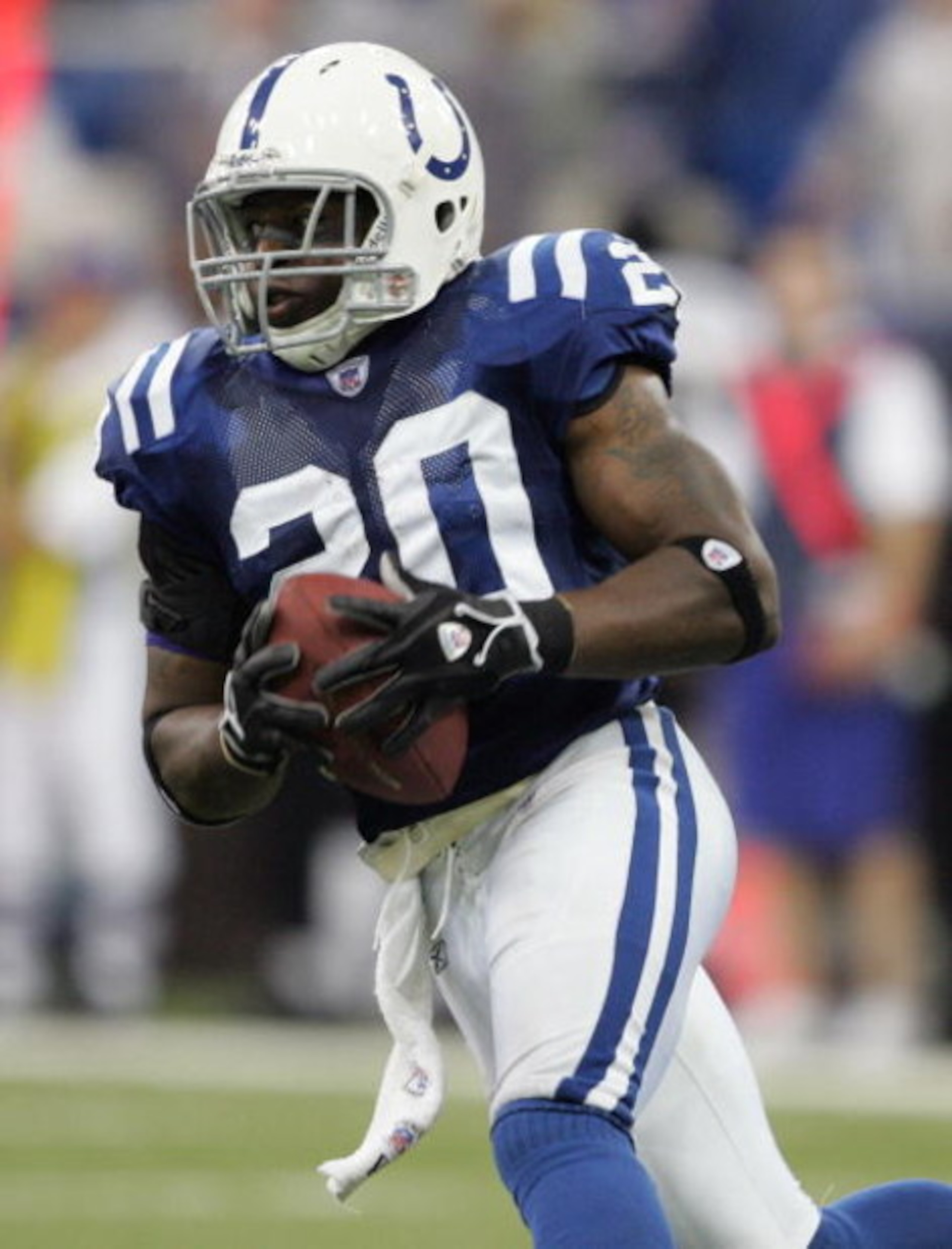 INDIANAPOLIS - SEPTEMBER 24:  Mike Doss #20 of the Indianapolis Colts runs with the ball after he intercepted it on the last drive of the game by the Jacksonville Jaguars September 24, 2006 at the RCA Dome in Indianapolis, Indiana. The Colts won 21-7.  (P