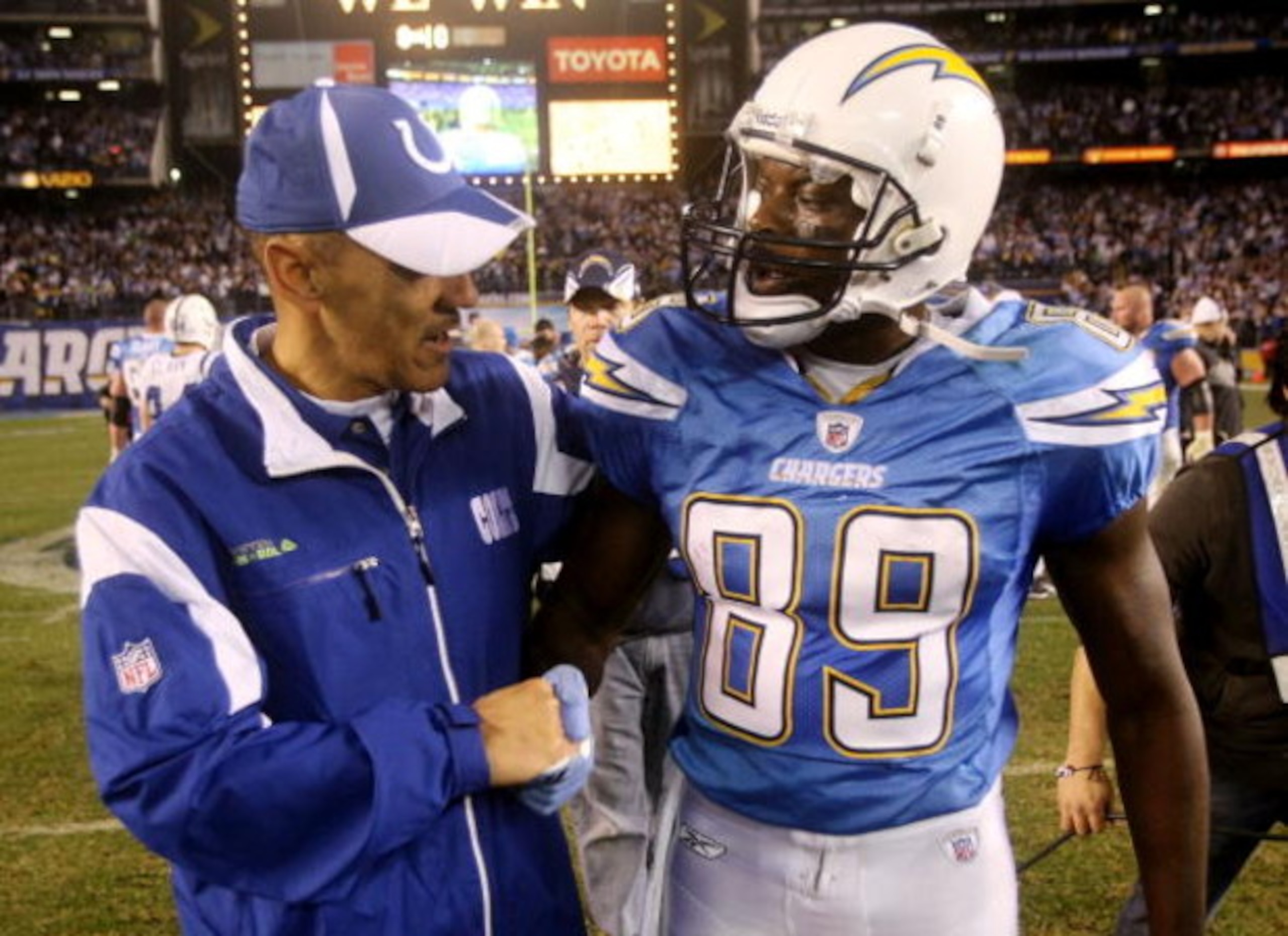 SAN DIEGO - JANUARY 03:  Chris Chambers #89 of the San Diego Chargers talks with Indianapolis Colts head coach Tony Dungy after the Chargers defeated the Colts 23-17 in overtime in the AFC Wild Card Game on January 3, 2009 at Qualcomm Stadium in San Diego