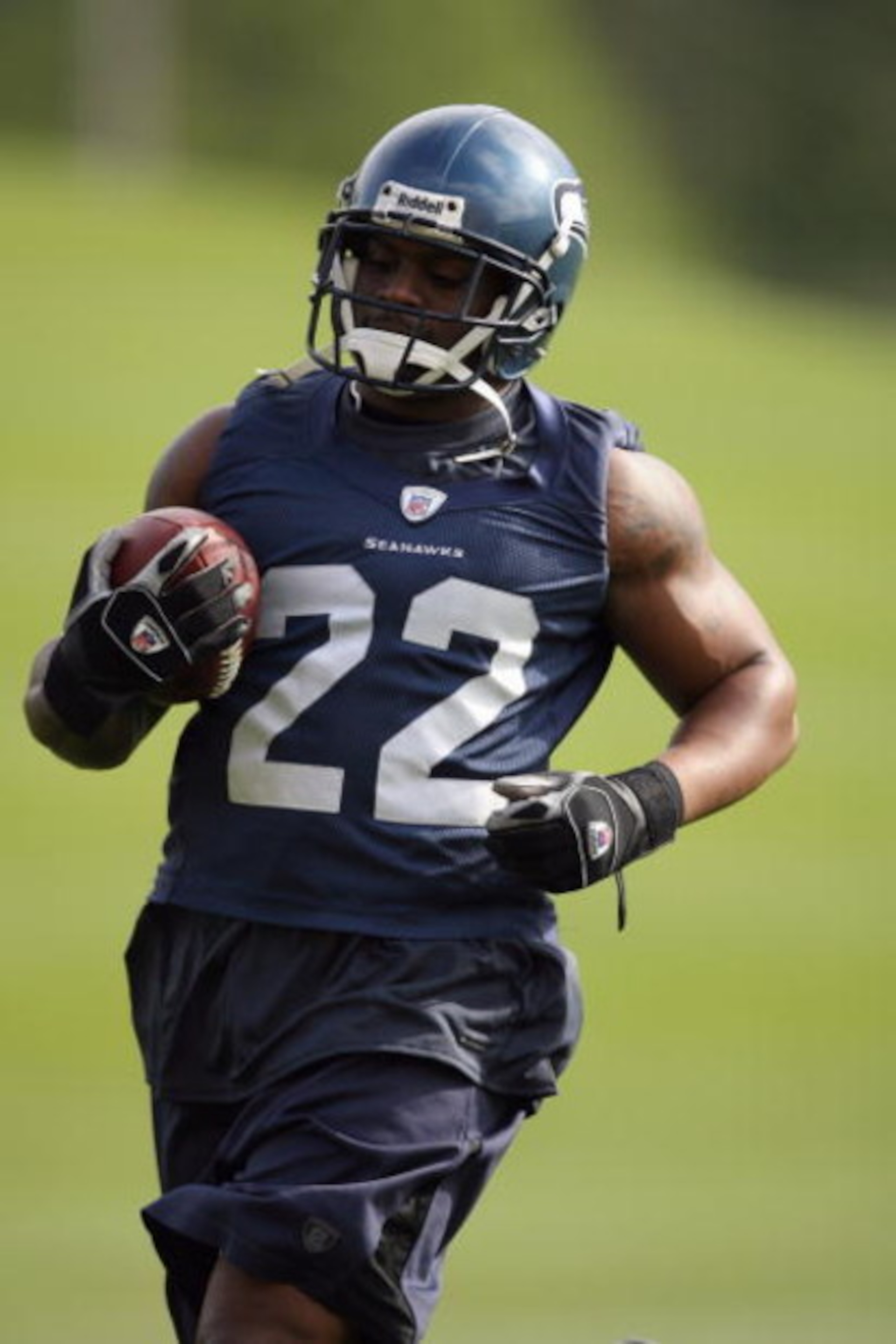 RENTON, WA - MAY 2:  Julius Jones #22 of the Seattle Seahawks runs with the ball during minicamp at the Seahawks training facility on May 2, 2009 in Renton, Washington. (Photo by Otto Greule Jr/Getty Images) 