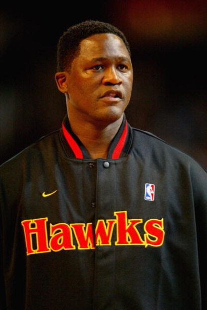 ATLANTA - FEBRUARY 8:  Dominique Wilkins of the Atlanta Team looks on before the Jeep Hoop it Up Game during the 2003 NBA All Star weekend at Philips Arena on February 8, 2003 in Atlanta, Georgia.  NOTE TO USER: User expressly acknowledges and agrees that