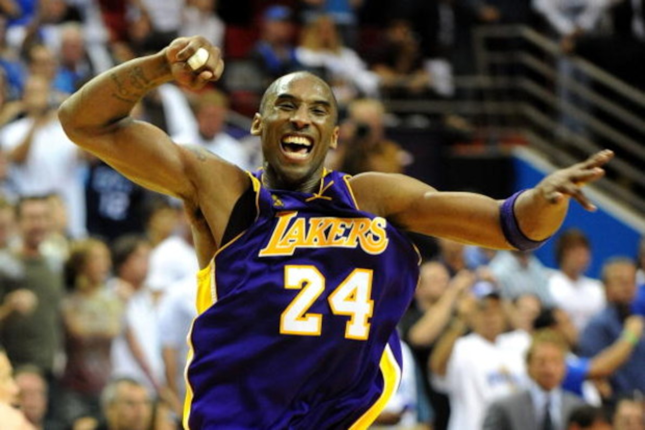 ORLANDO, FL - JUNE 14:  Kobe Bryant #24 of the Los Angeles Lakers celebrates after defeating the Orlando Magic 99-86 in Game Five of the 2009 NBA Finals on June 14, 2009 at Amway Arena in Orlando, Florida.  NOTE TO USER:  User expressly acknowledges and a