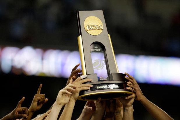DETROIT - APRIL 06: The North Carolina Tar Heels celebrates with the championship trophy after defeating the Michigan State Spartans 89-72 during the 2009 NCAA Division I Men's Basketball National Championship game at Ford Field on April 6, 2009 in Detroi