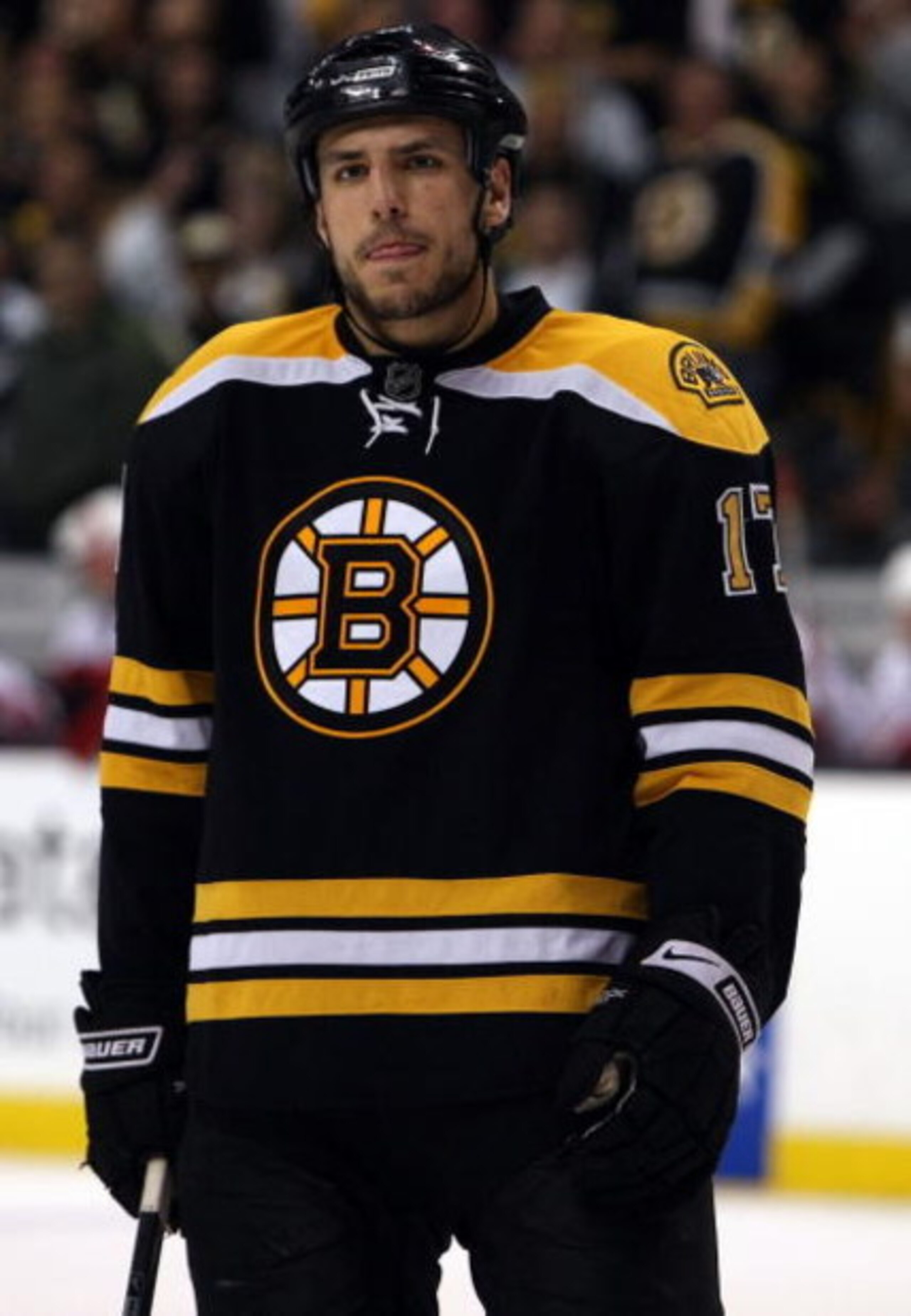 BOSTON - MAY 14:  Milan Lucic #17 of the Boston Bruins looks on before a face off against the Carolina Hurricanes during Game Seven of the Eastern Conference Semifinal Round of the 2009 Stanley Cup Playoffs on May 14, 2009 at the TD Banknorth Garden in Bo