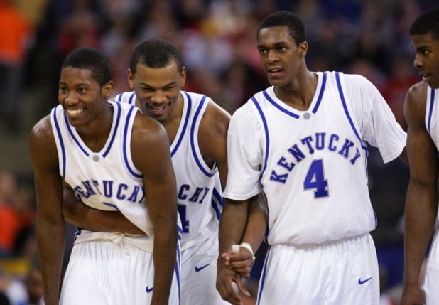 INDIANAPOLIS - MARCH 19:  (L-R) Ravi Moss #2, Chuck Hayes #44 and Rajon Rondo #4 of the Kentucy Wildcats celebrate in the final seconds of their 69-60 win over the Cincinnati Bearcats in the second round game of the NCAA Division I Men's Basketball Tourna