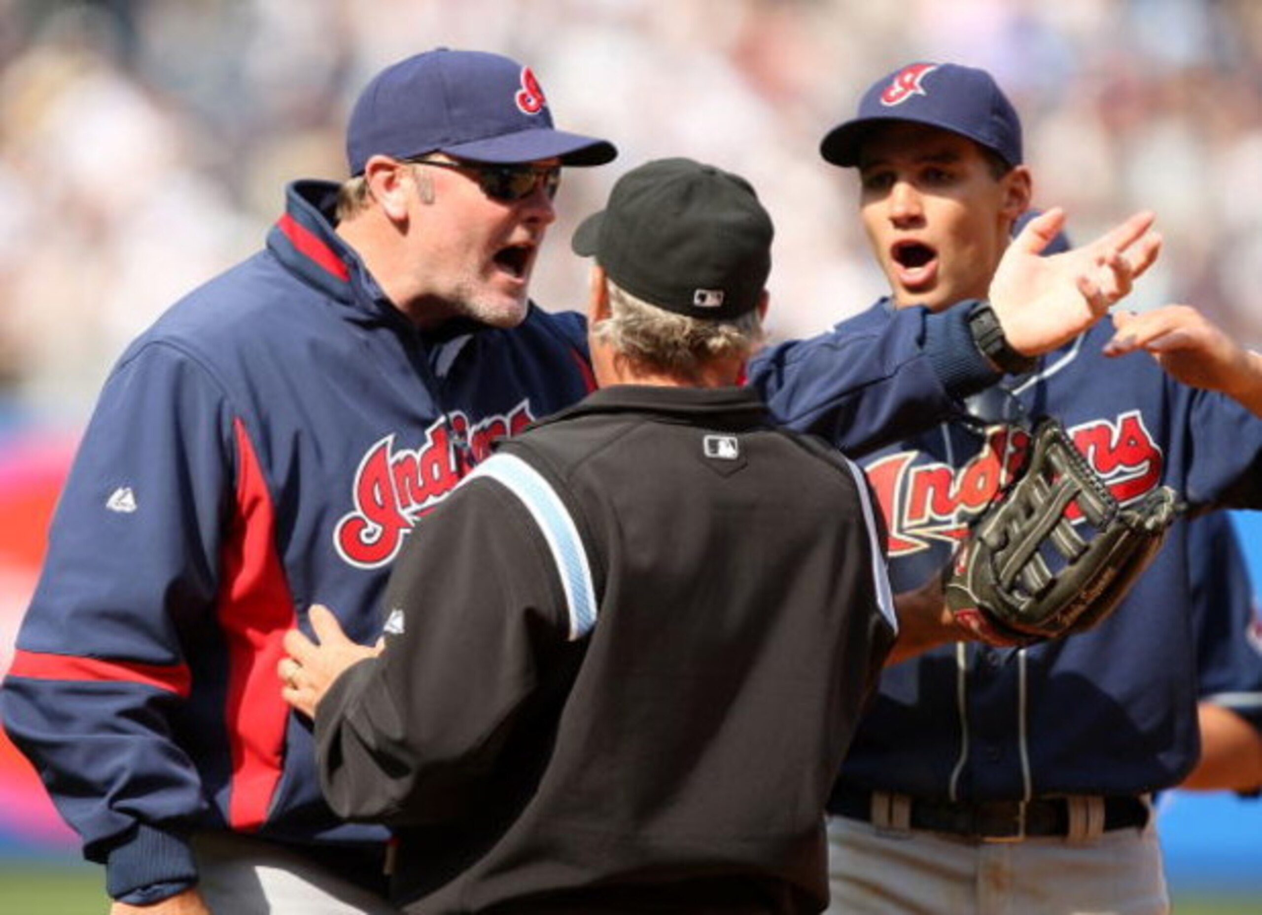 NEW YORK - APRIL 19: Cleveland Indians manager Eric Wedge and Grady Sizemore #24 argue with the umpire about a pinch hit two-run home run by Jorge Posada of the New York Yankees in the seventh inning of their game against the Cleveland Indians at Yankee NEW YORK - APRIL 19: Cleveland Indians manager Eric Wedge and Grady Sizemore #24 argue with the umpire about a pinch hit two-run home run by Jorge Posada of the New York Yankees in the seventh inning of their game against the Cleveland Indians at Yankee