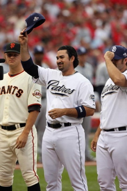 ST. LOUIS, MO - JULY 14:  National League All-Star Adrian Gonzalez of the San Diego Padres tips his hat during introductions before the 2009 MLB All-Star Game at Busch Stadium on July 14, 2009 in St. Louis, Missouri. (Photo by Dilip Vishwanat/Getty Images