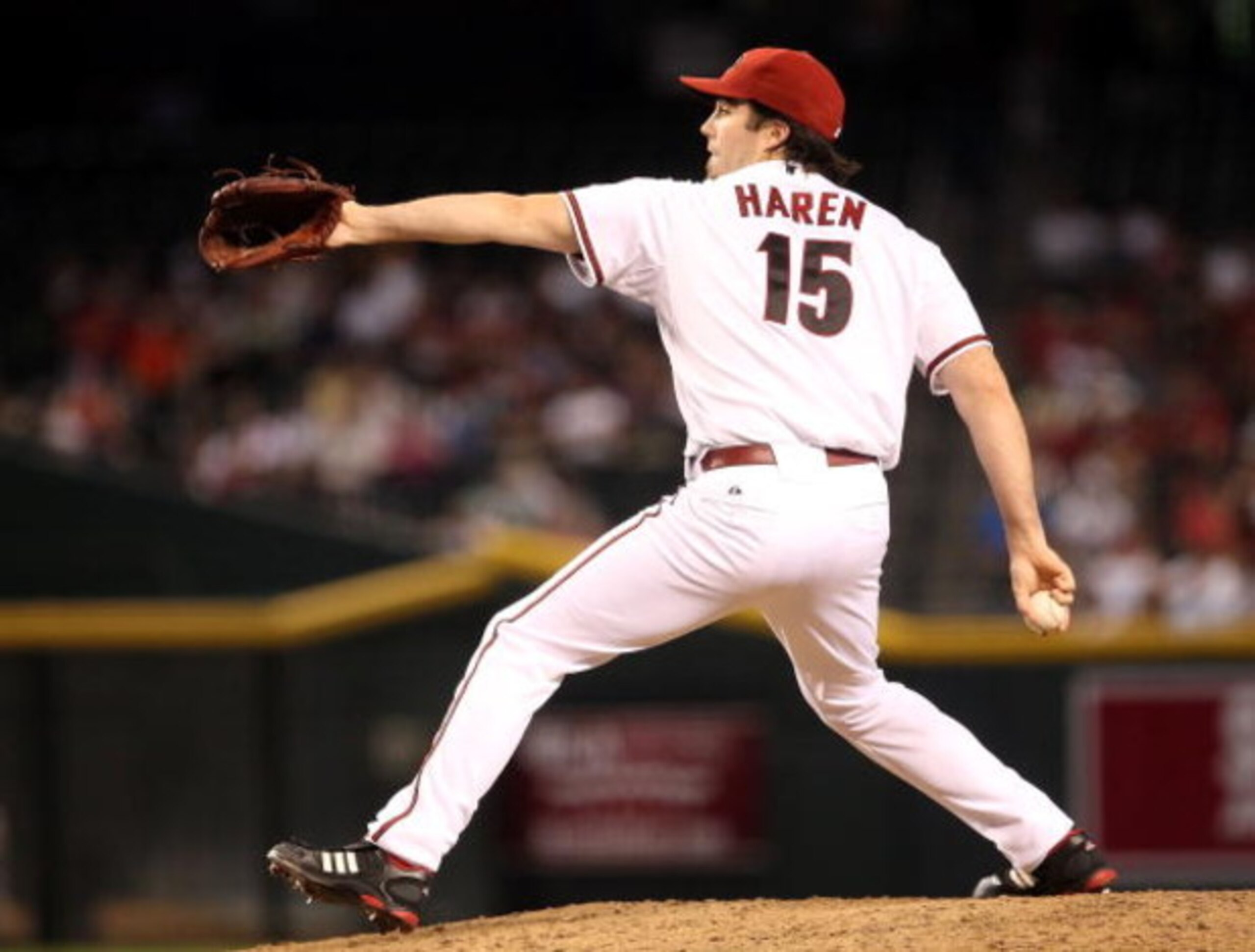PHOENIX - JULY 10: Starting pitcher Dan Haren #15 of the Arizona Diamondbacks pitches against the Florida Marlins during the major league baseball game at Chase Field on July 10, 2009 in Phoenix, Arizona. The Diamondbacks defeated the Marlins 8-0. (Phot PHOENIX - JULY 10: Starting pitcher Dan Haren #15 of the Arizona Diamondbacks pitches against the Florida Marlins during the major league baseball game at Chase Field on July 10, 2009 in Phoenix, Arizona. The Diamondbacks defeated the Marlins 8-0. (Phot