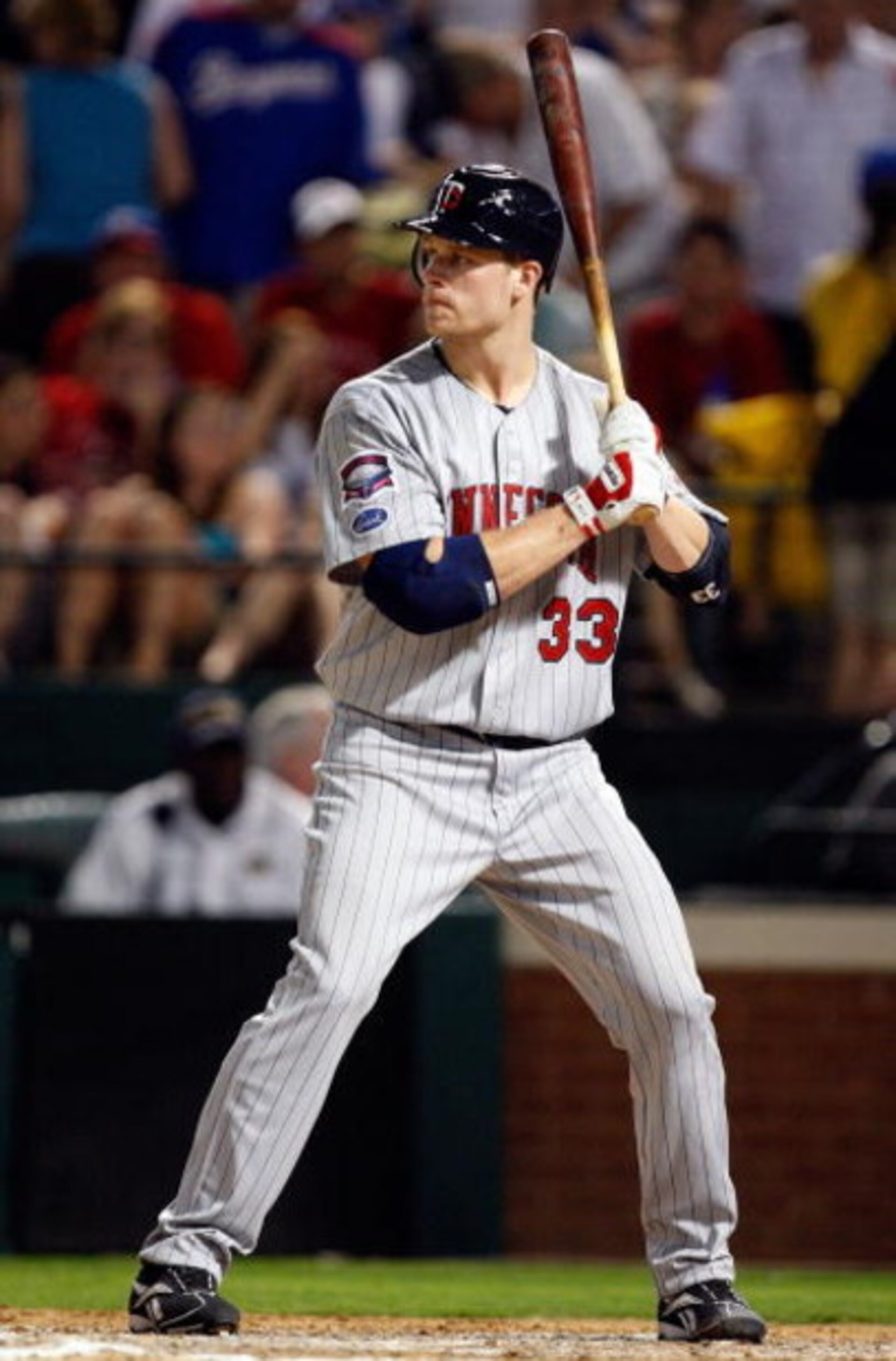 ARLINGTON, TX - JULY 17: First baseman Justin Morneau #33 of the Minnesota Twins on July 17, 2009 at Rangers Ballpark in Arlington, Texas. (Photo by Ronald Martinez/Getty Images) ARLINGTON, TX - JULY 17: First baseman Justin Morneau #33 of the Minnesota Twins on July 17, 2009 at Rangers Ballpark in Arlington, Texas. (Photo by Ronald Martinez/Getty Images)