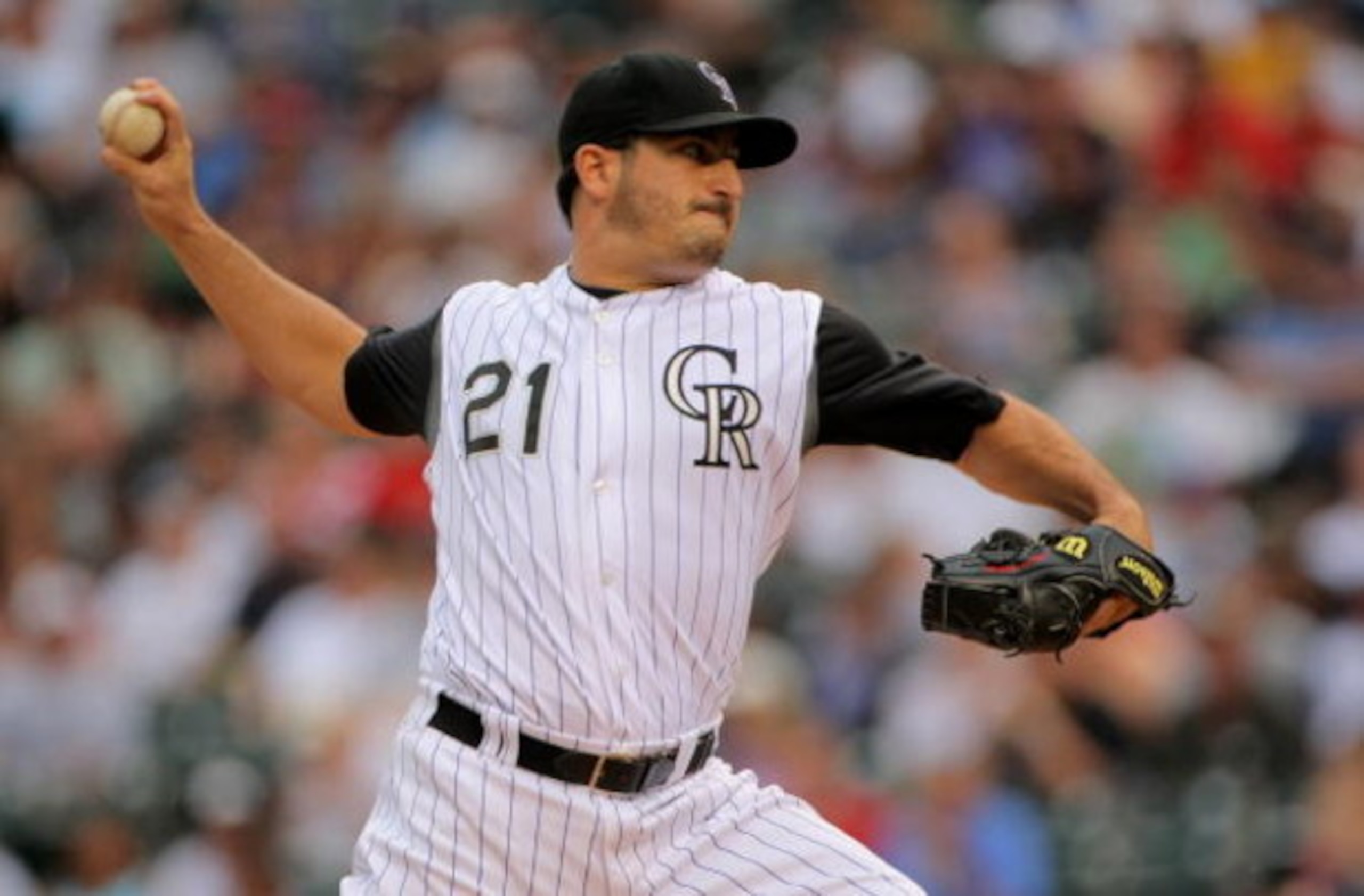 DENVER - JULY 11: Starting pitcher Jason Marquis #21 of the Colorado Rockies delivers against the Atlanta Braves during MLB action at Coors Field on July 11, 2009 in Denver, Colorado. (Photo by Doug Pensinger/Getty Images) DENVER - JULY 11: Starting pitcher Jason Marquis #21 of the Colorado Rockies delivers against the Atlanta Braves during MLB action at Coors Field on July 11, 2009 in Denver, Colorado. (Photo by Doug Pensinger/Getty Images)