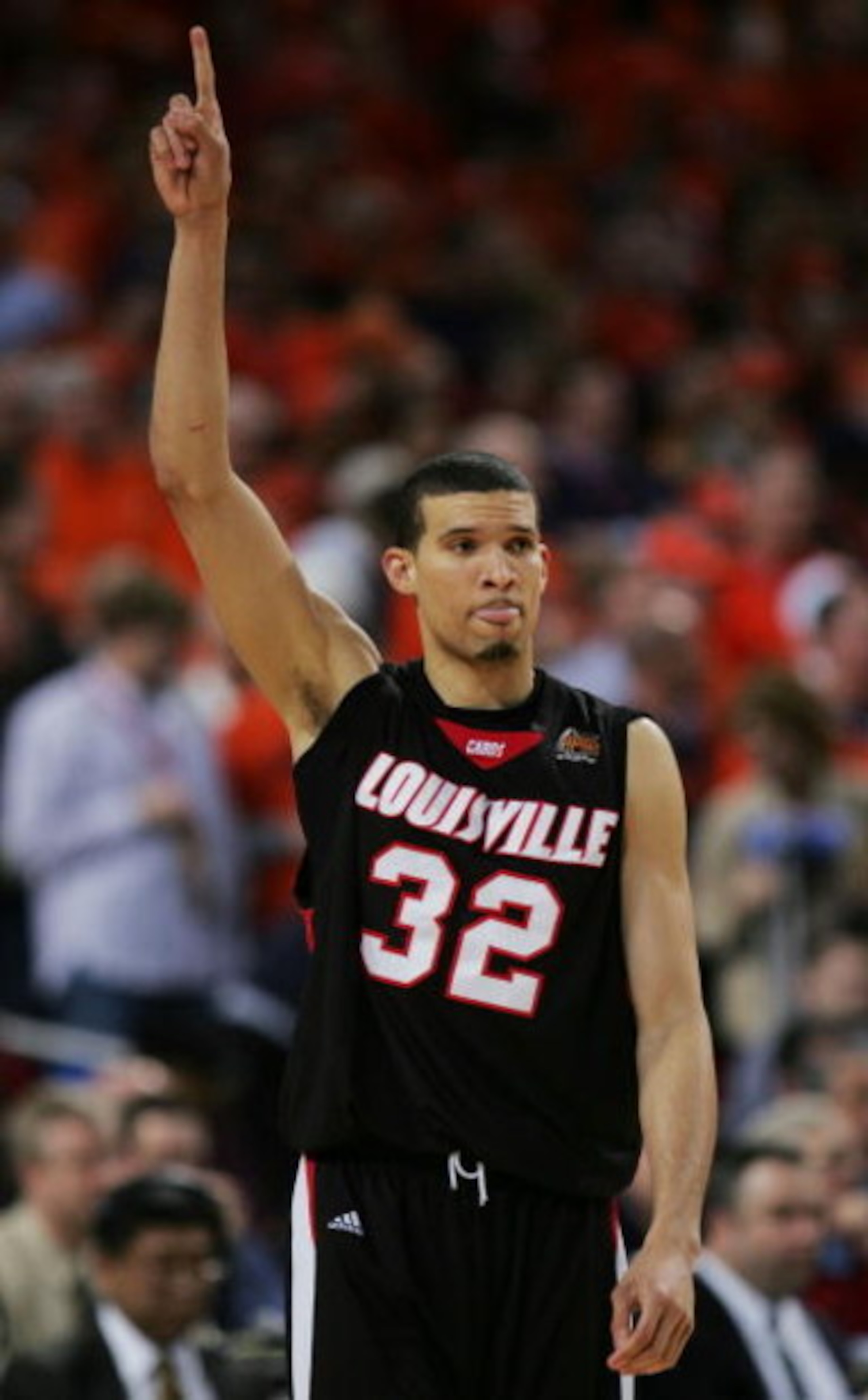 ST. LOUIS - APRIL 02:  Francisco Garcia #32 of the Louisville Cardinals gestures as he takes the court against the Illinois Fighting Illini during the NCAA Men's Final Four at the Edward Jones Dome on April 2, 2005 in St. Louis, Missouri.  (Photo by Ronal
